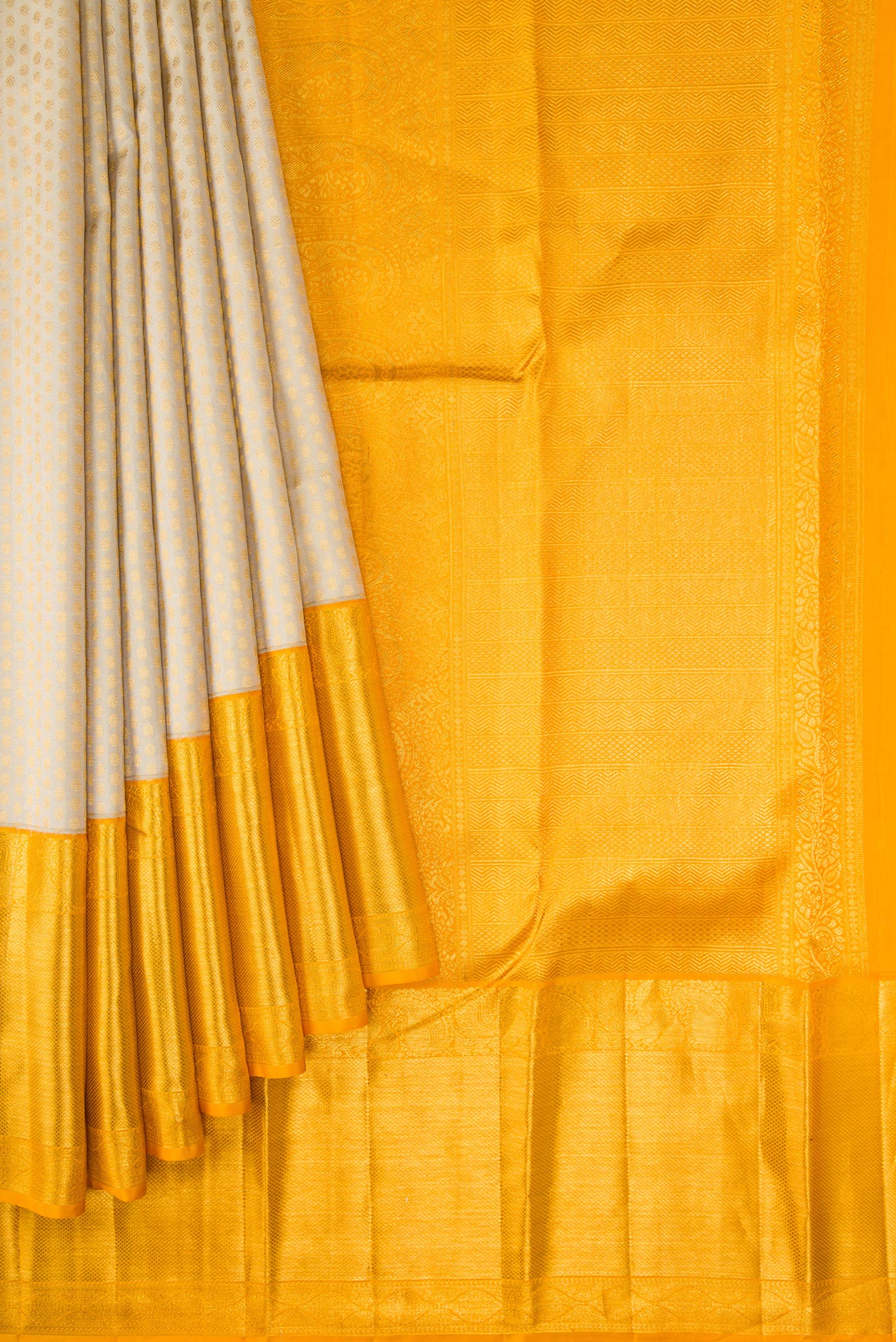 Pleats and pallu of Beige Dual Tone Kanjivaram Silk Saree with Zari Brocade on the body and Zari Border. 