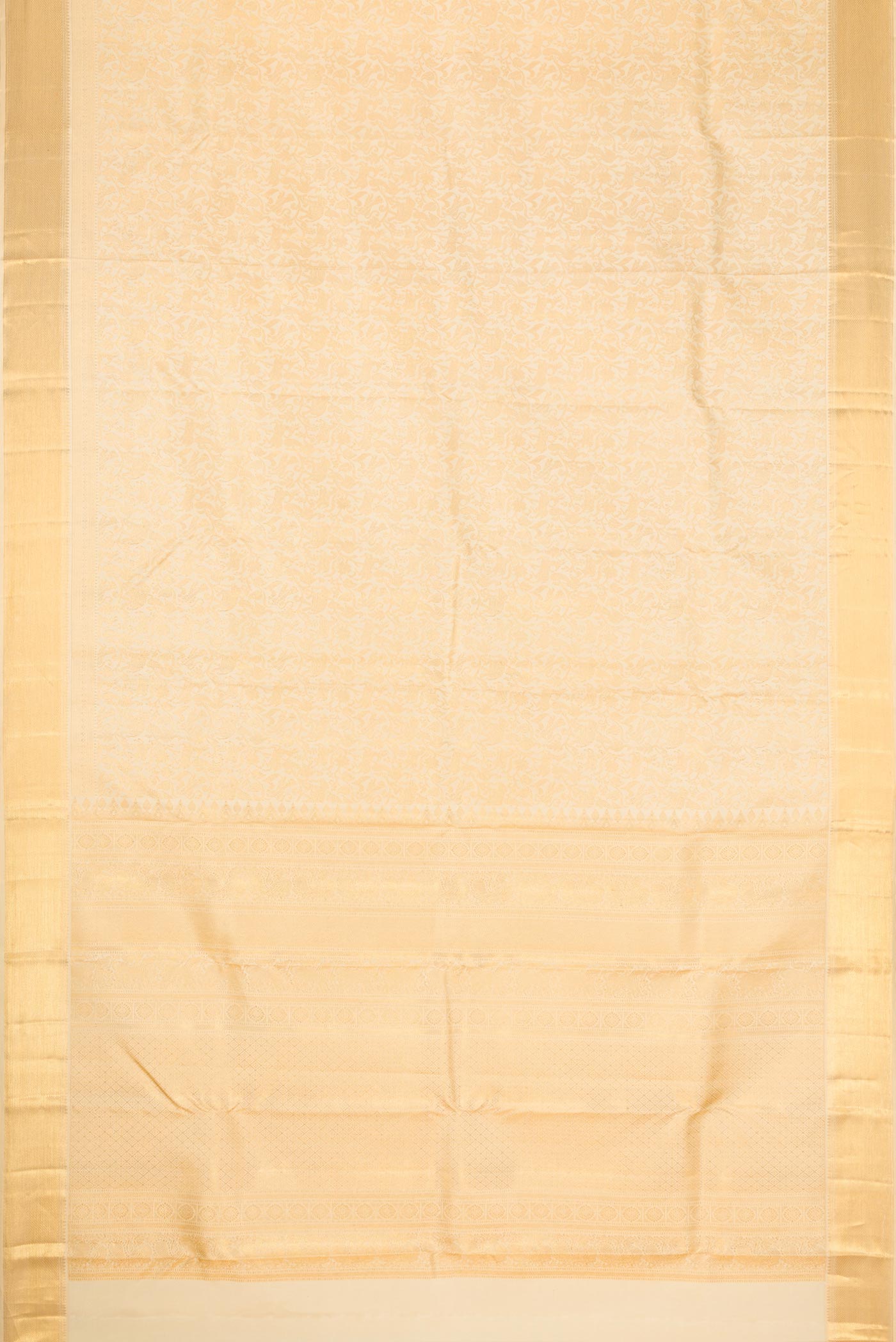 Flat view of Beige Dual Tone Kanjivaram Silk Saree with Zari Brocade on the body and Zari Border. 