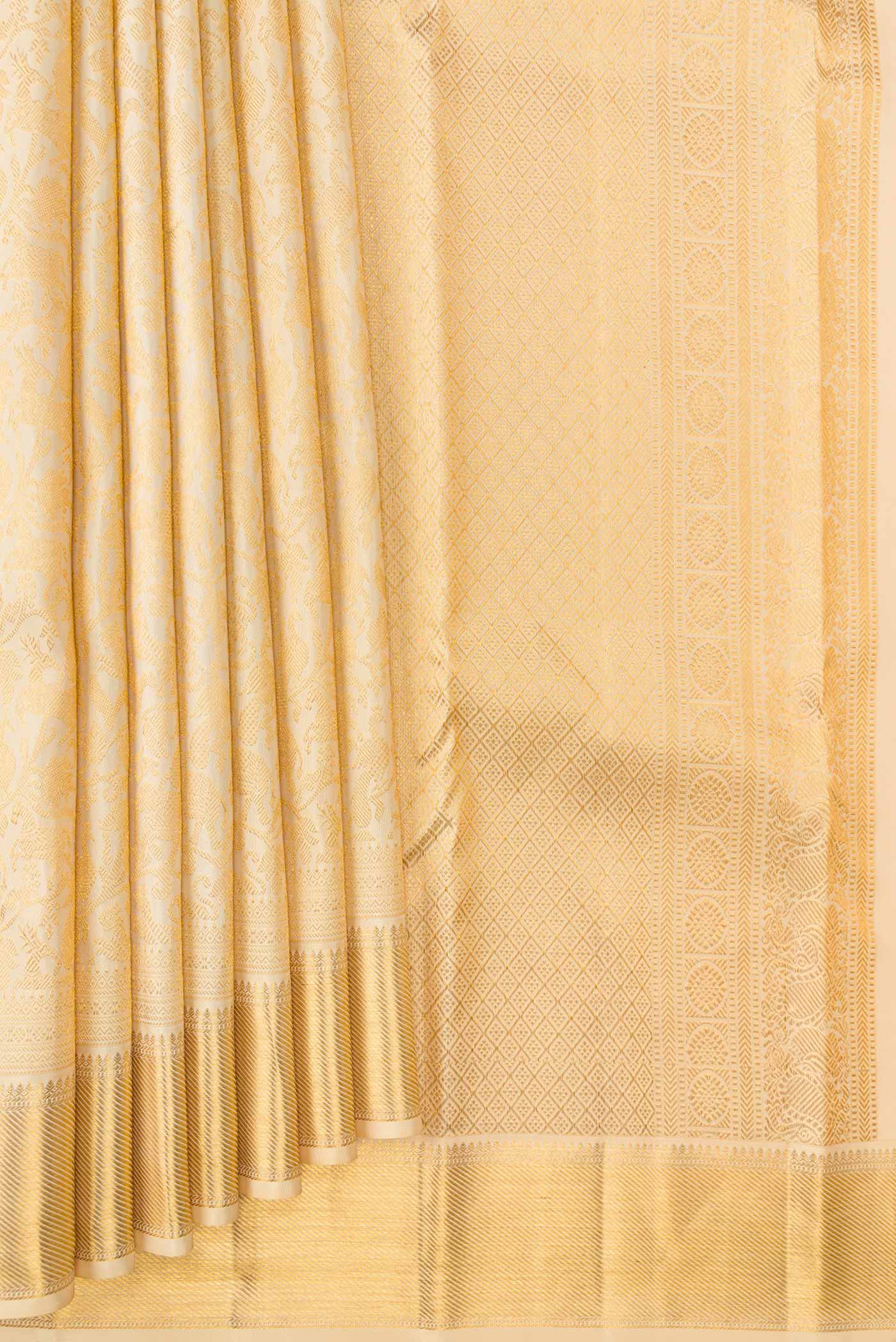 Pleats and pallu of Beige Dual Tone Kanjivaram Silk Saree with Zari Brocade on the body and Zari Border. 