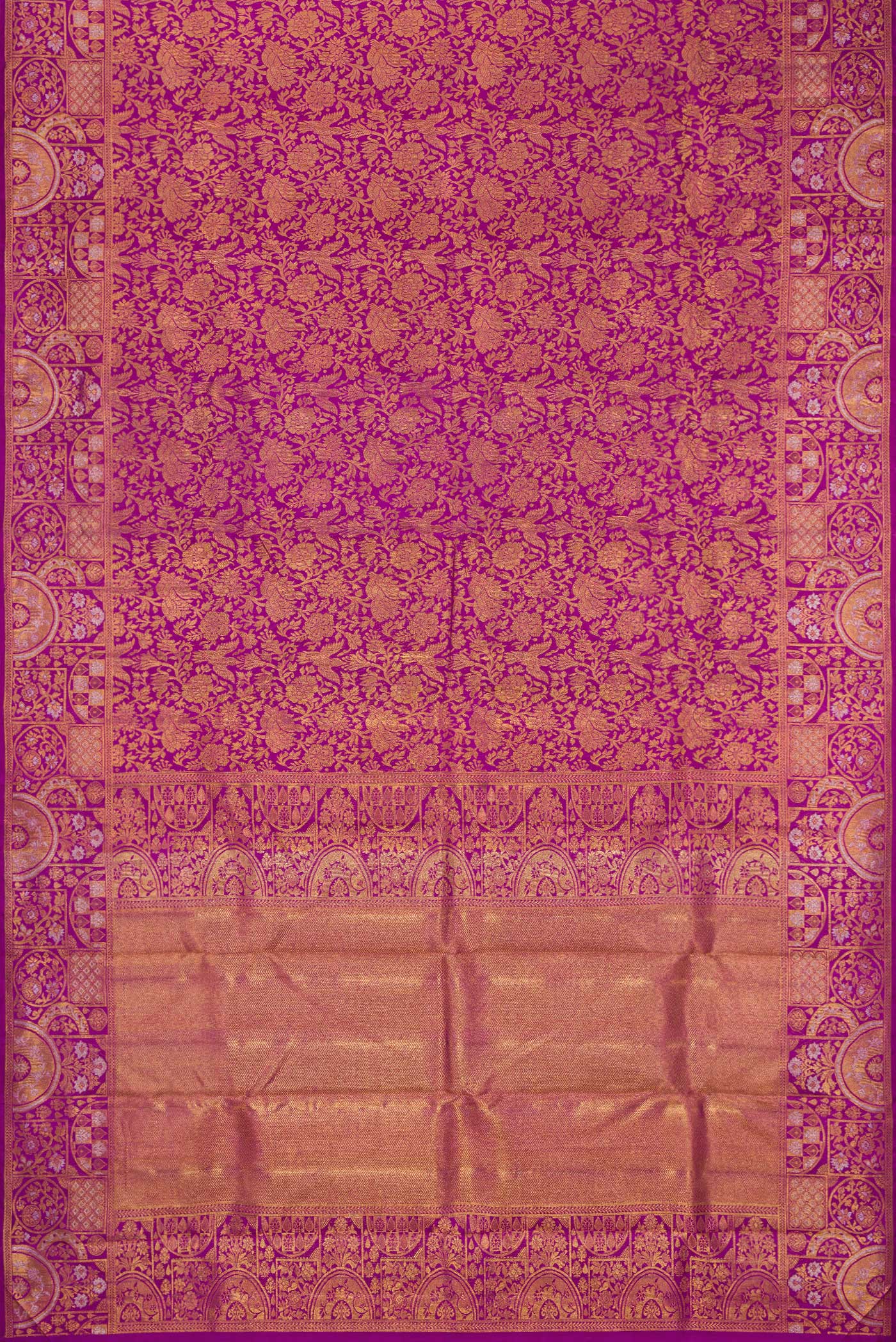 Flat view of Magenta Kanjivaram Silk Saree with Zari Brocade on the body and Fancy Border. 