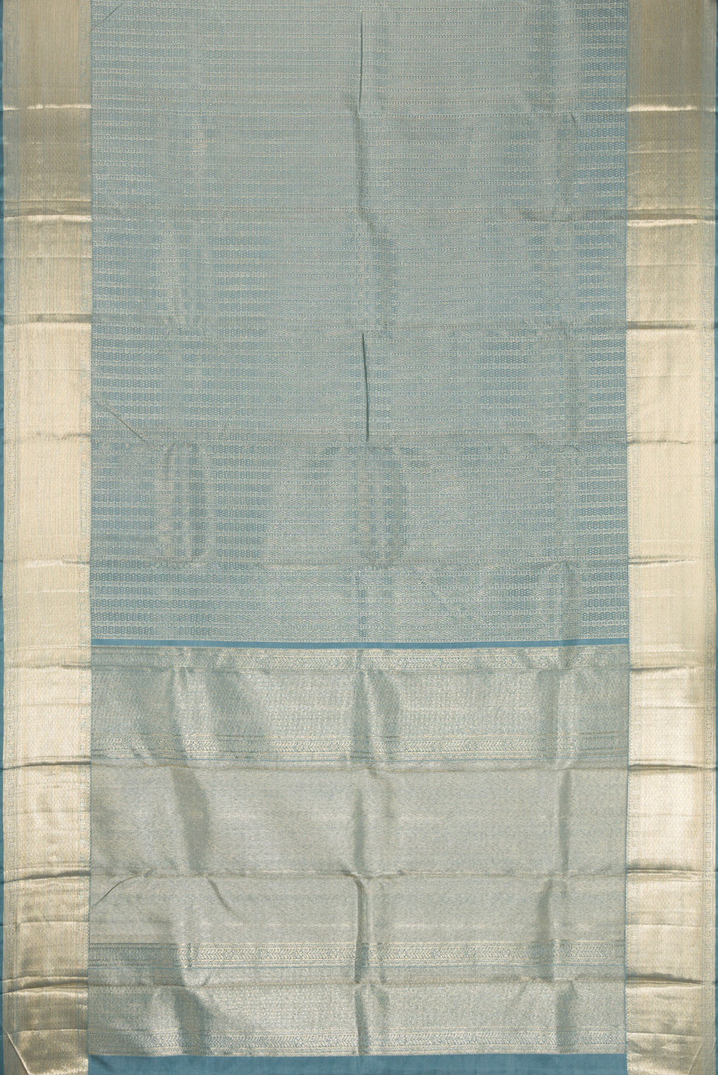 Flat view of Grey Dual Tone Kanchipuram Silk Saree with Zari Brocade on the body and Zari Border. 