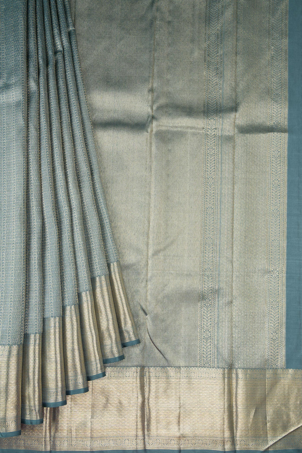 Pleats and pallu of Grey Dual Tone Kanchipuram Silk Saree with Zari Brocade on the body and Zari Border. 