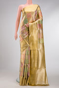 Gold, Pink and Green Color Kanjivaram Tissue Silk Saree with Zari Brocade on the body and Zari Border.  displayed on a mannequin