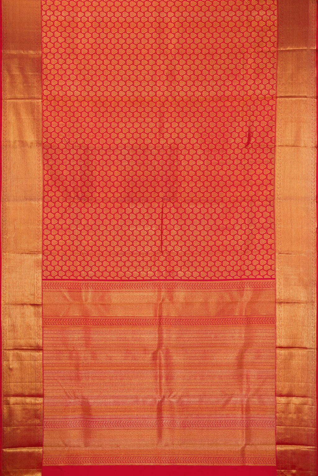 Flat view of Red Kanchipuram Silk Saree with Zari Brocade on the body and Zari Border. 