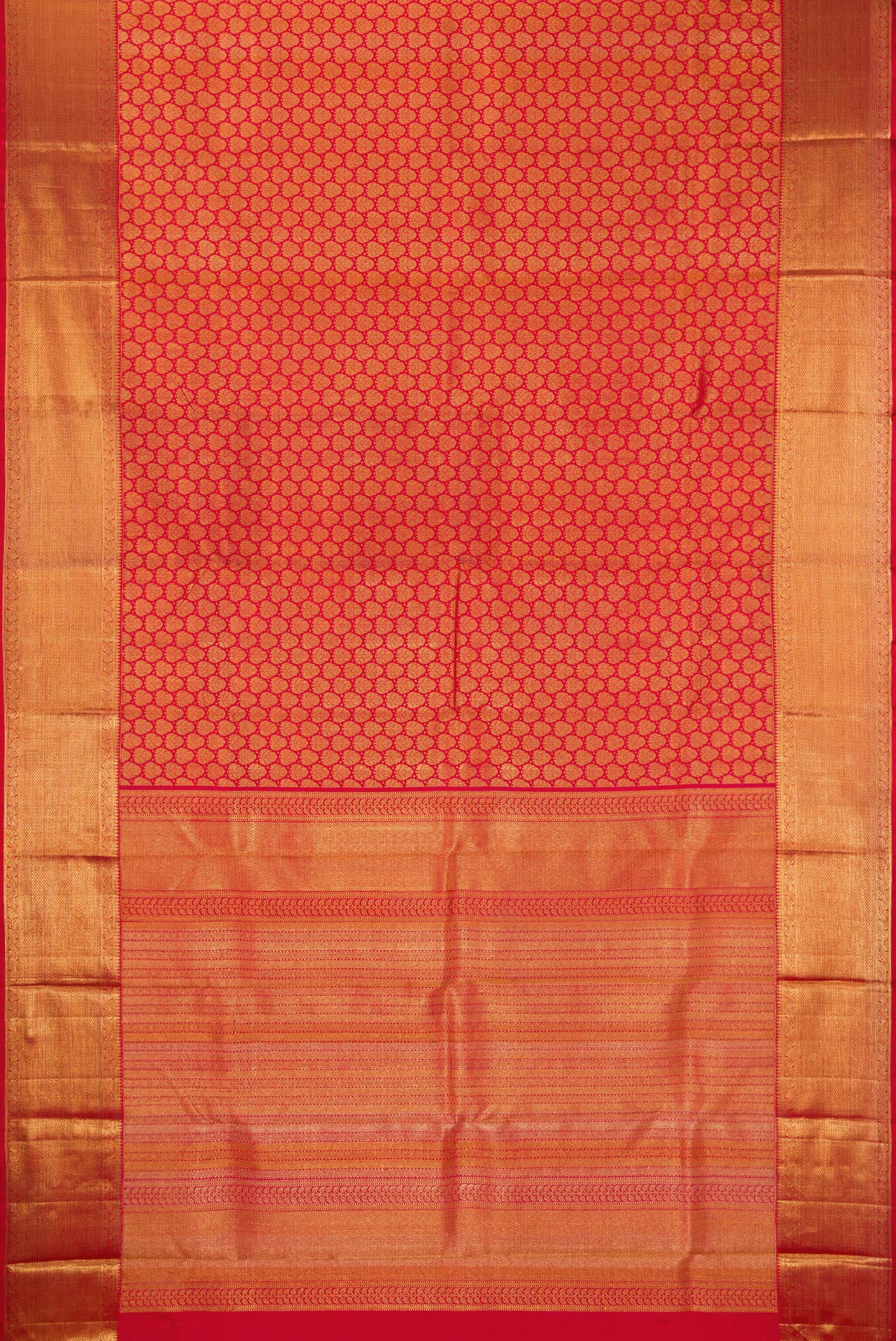 Flat view of Red Kanchipuram Silk Saree with Zari Brocade on the body and Zari Border. 