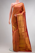 Red Dual Tone Kanchipuram Silk Saree with Zari Brocade on the body and Zari Border.  displayed on a mannequin