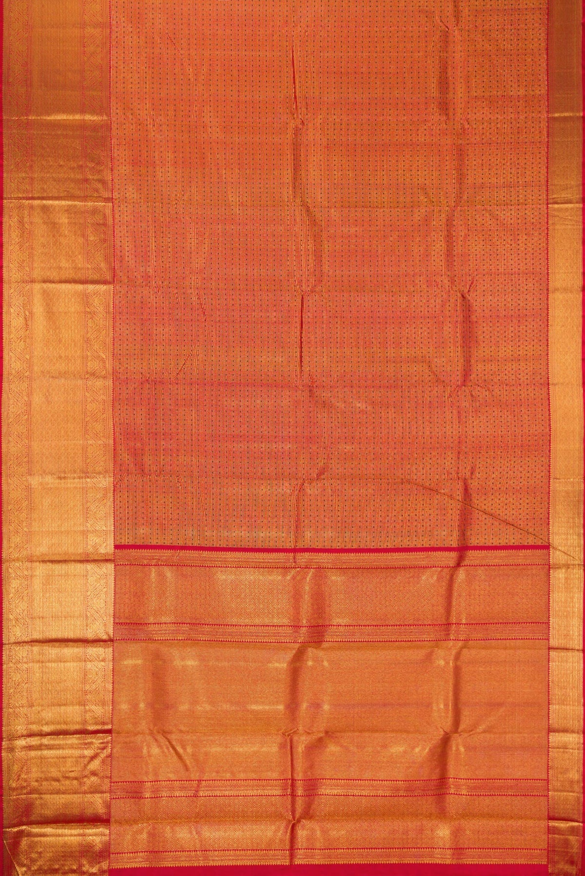 Flat view of Red Dual Tone Kanchipuram Silk Saree with Zari Brocade on the body and Zari Border. 