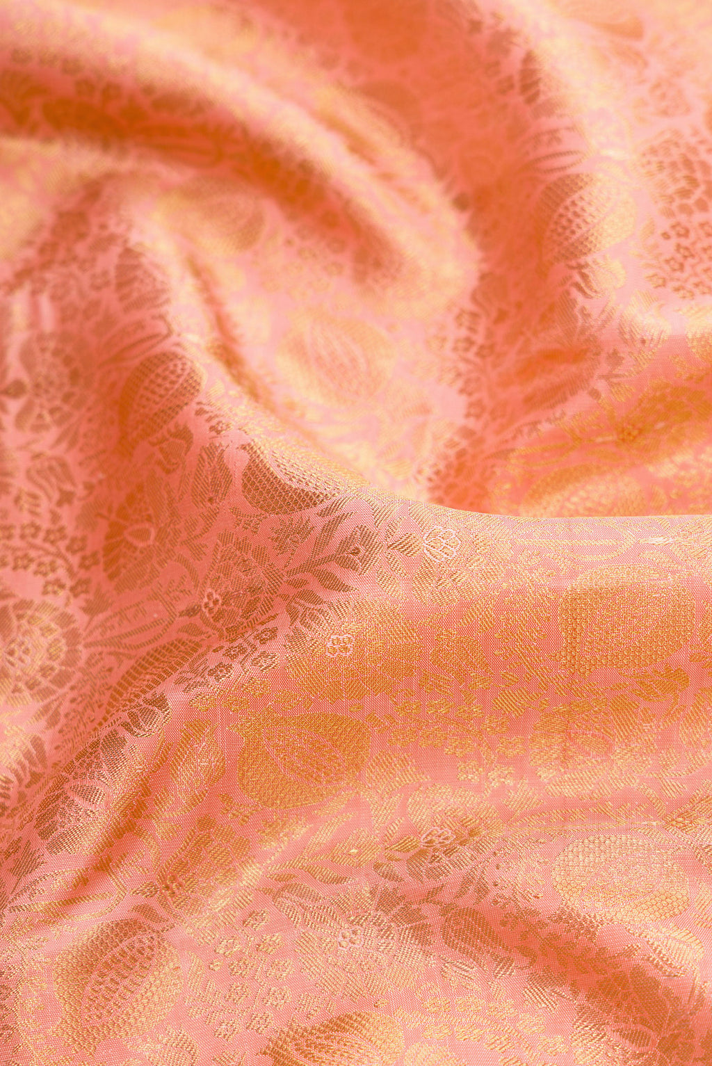 Close up of Pure Silk Pure Zari Pink Dual Tone Kanjivaram Saree with Zari Brocade on the body and Zari Border.  displaying folds