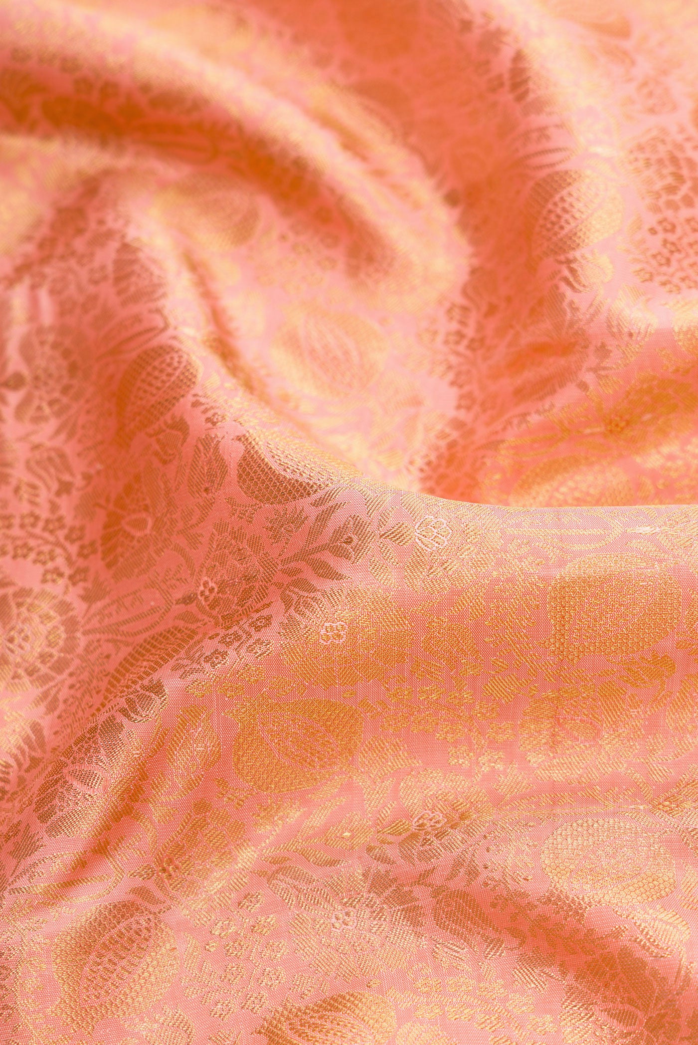 Close up of Pure Silk Pure Zari Pink Dual Tone Kanjivaram Saree with Zari Brocade on the body and Zari Border.  displaying folds