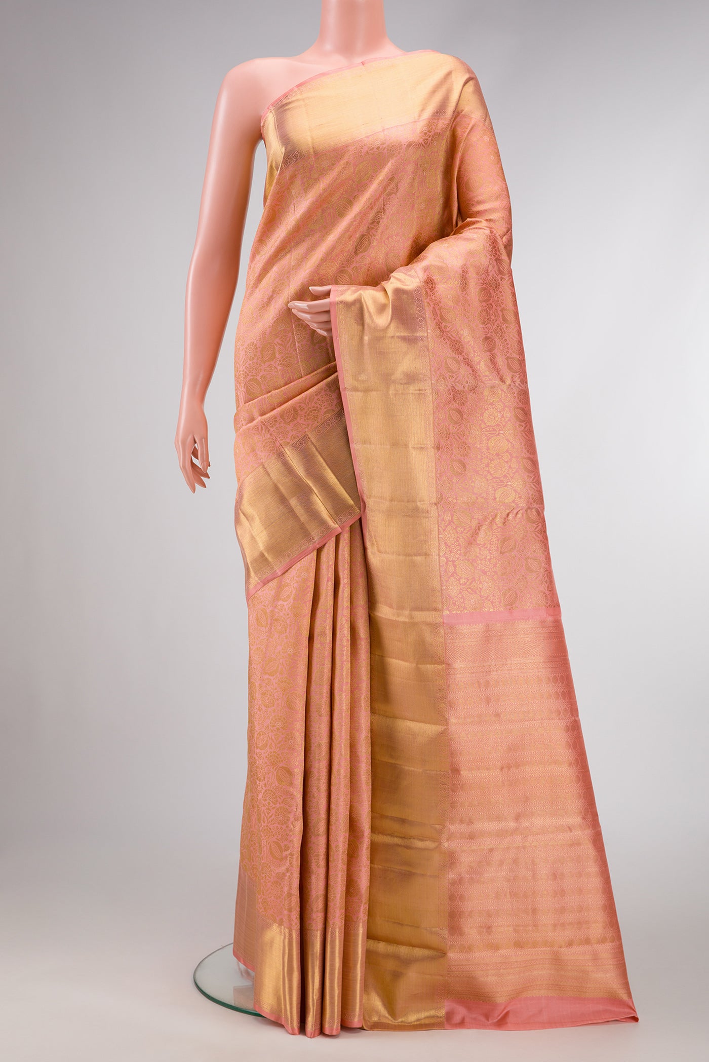 Pure Silk Pure Zari Pink Dual Tone Kanjivaram Saree with Zari Brocade on the body and Zari Border.  displayed on a mannequin