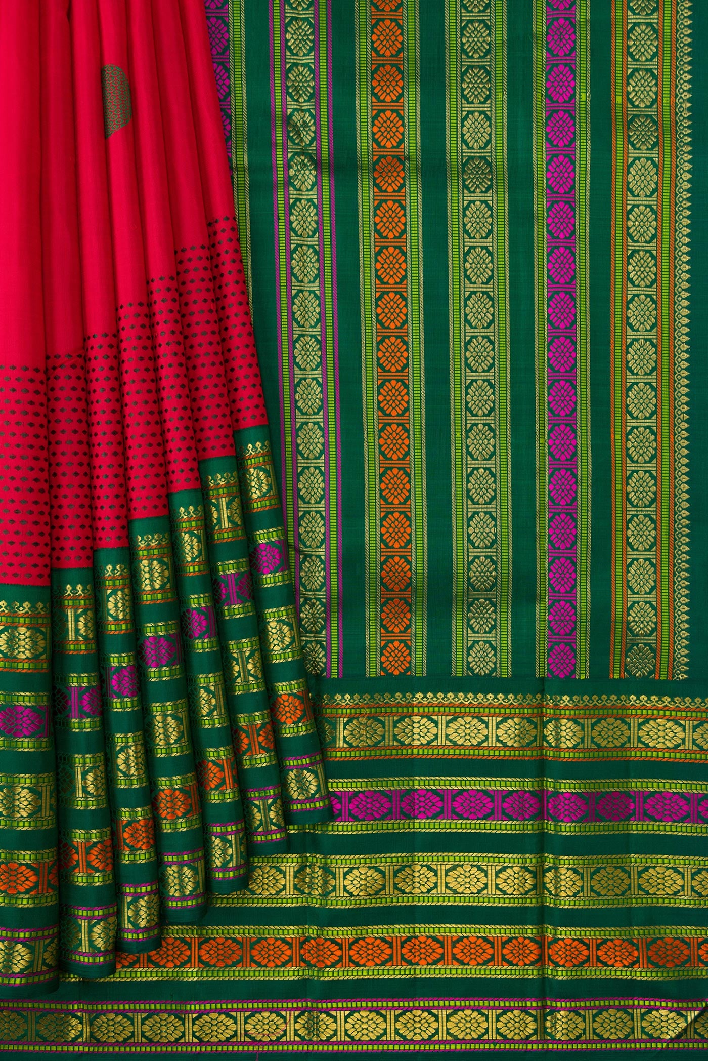 Pleats and pallu of Pure Silk Pure Zari Red Dual Tone Kanchipuram Saree with Thread Butta on the body and Zari And Thread Border. 