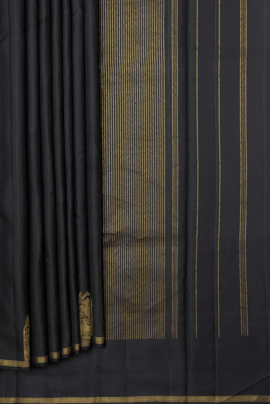 Pleats and pallu of Black Dual Tone Kanchipuram Saree with Plain Body and Fancy Border. 