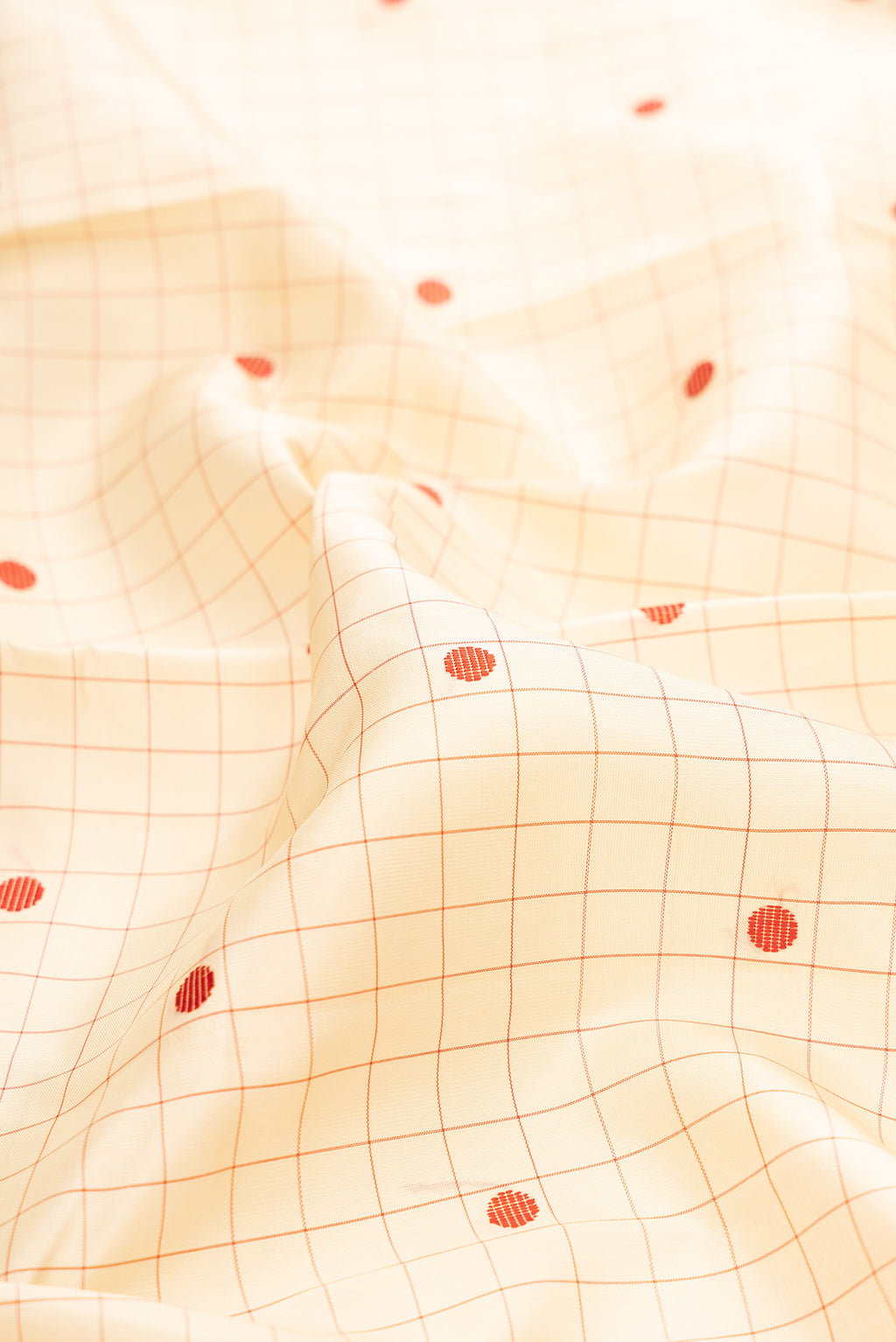 Close up of Pure Silk Sandal Kanjivaram Saree with Checked design on the body and Thread Border.  displaying folds