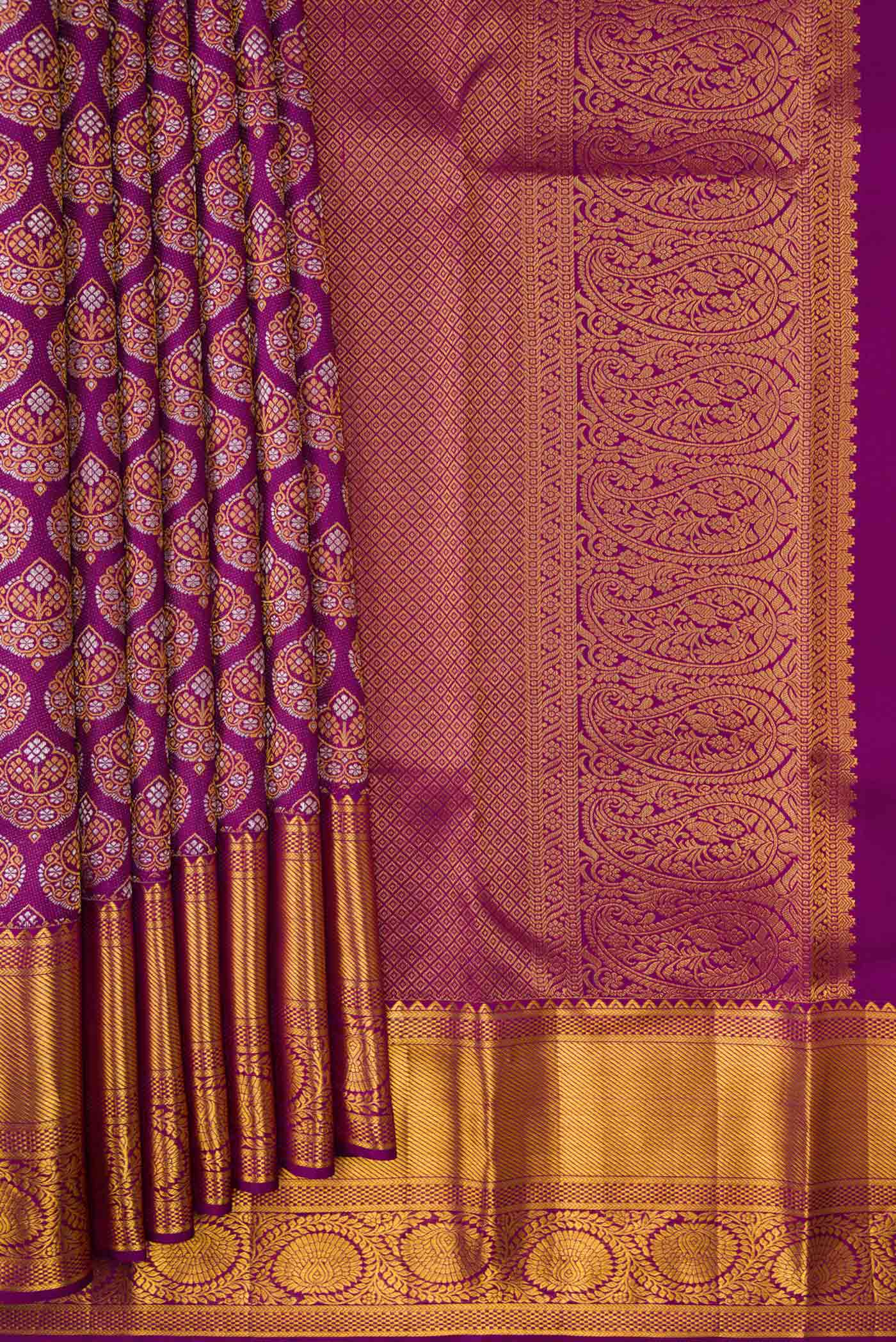 Pleats and pallu of Purple Dual Tone Kanchipuram Silk Saree with Zari Brocade on the body and Zari Border. 