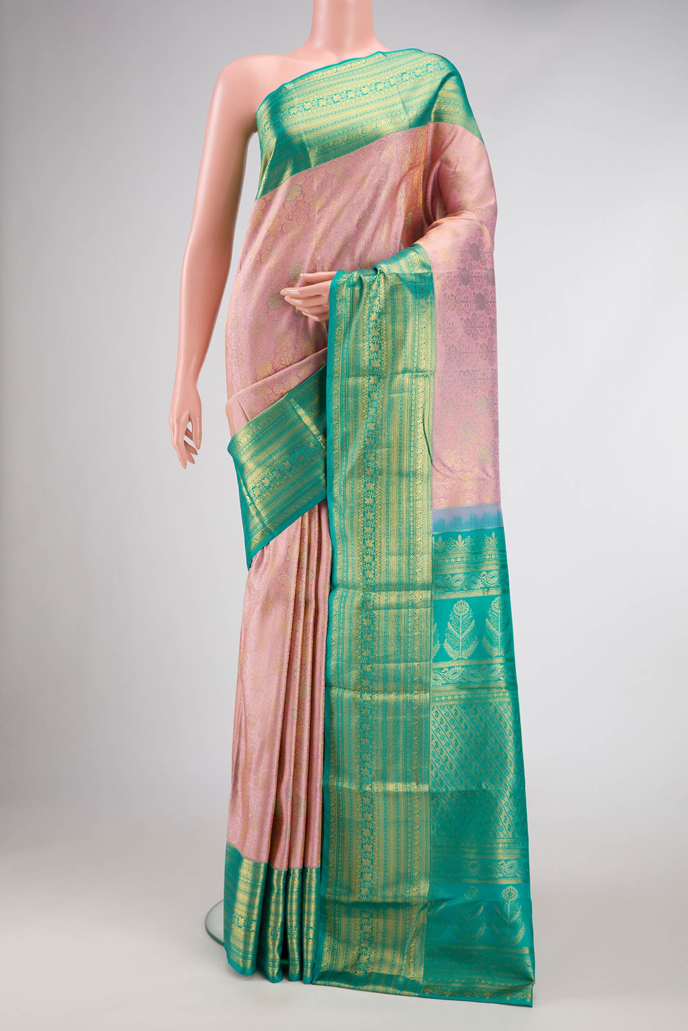 Rose Gold Dual Tone Kanchipuram Silk Saree with Zari Brocade on the body and Zari Border.  displayed on a mannequin