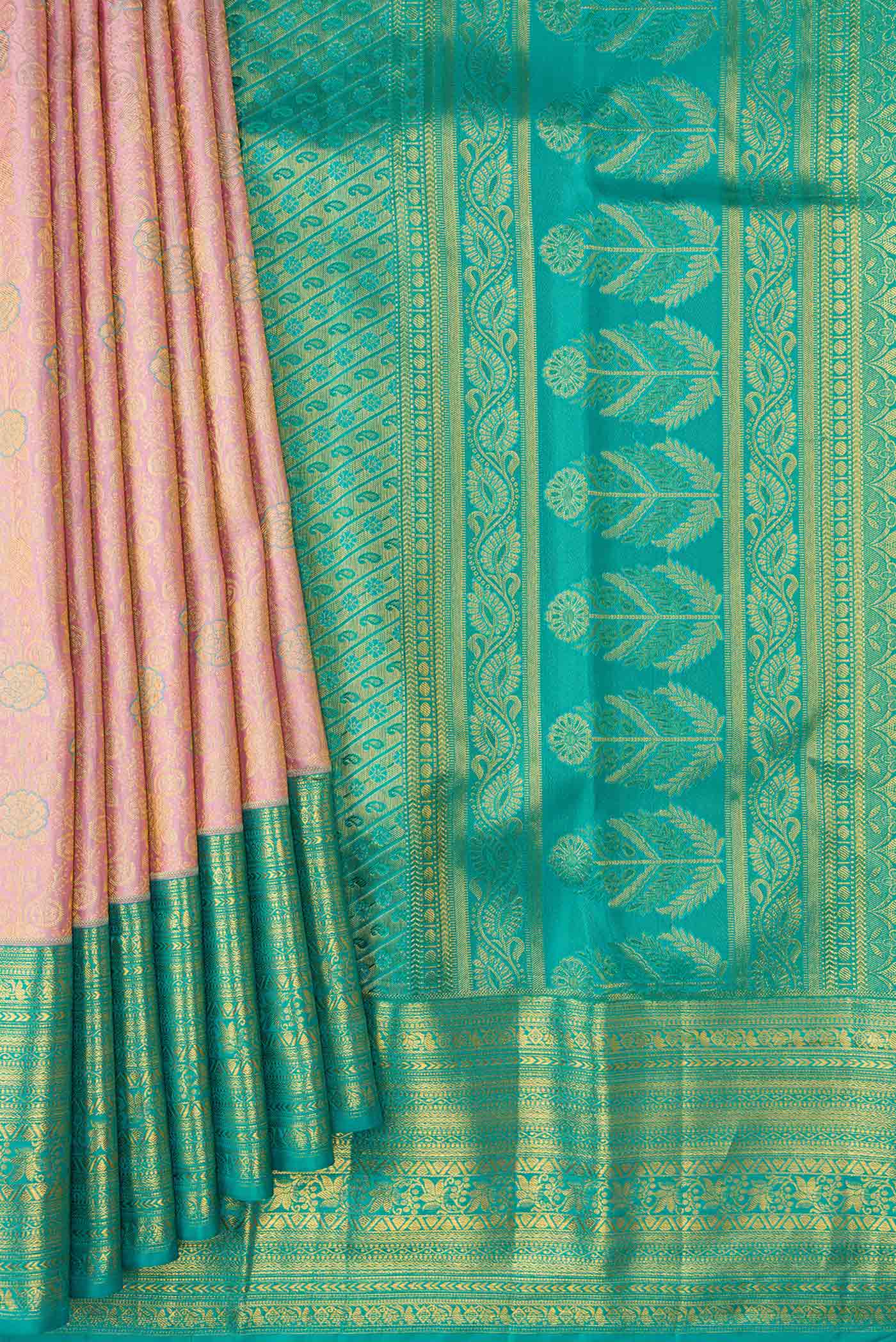 Pleats and pallu of Rose Gold Dual Tone Kanchipuram Silk Saree with Zari Brocade on the body and Zari Border. 