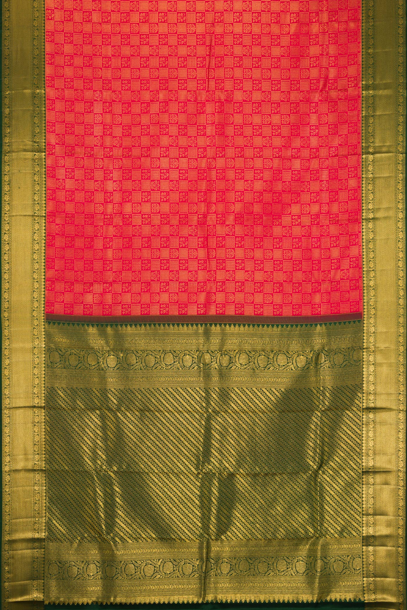 Flat view of Red Kanchipuram Silk Saree with Zari Brocade on the body and Zari Border. 