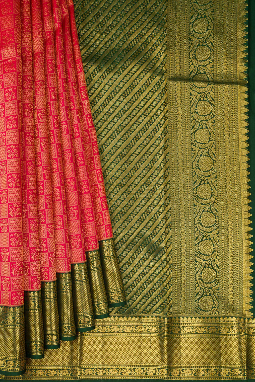 Pleats and pallu of Red Kanchipuram Silk Saree with Zari Brocade on the body and Zari Border. 