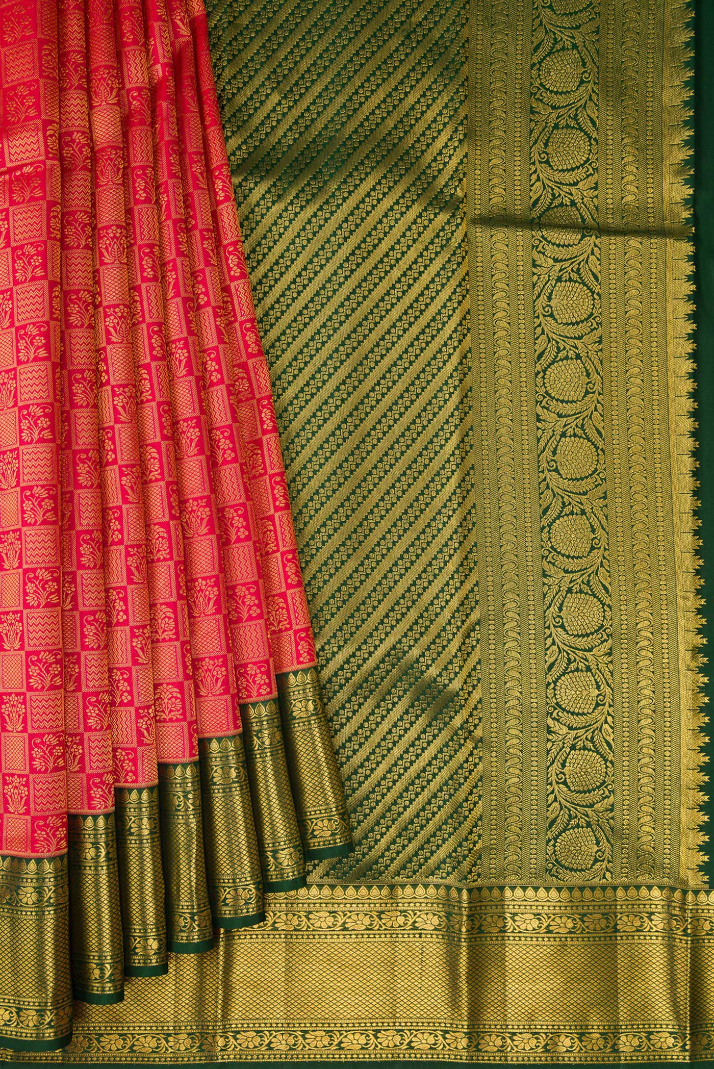 Pleats and pallu of Red Kanchipuram Silk Saree with Zari Brocade on the body and Zari Border. 