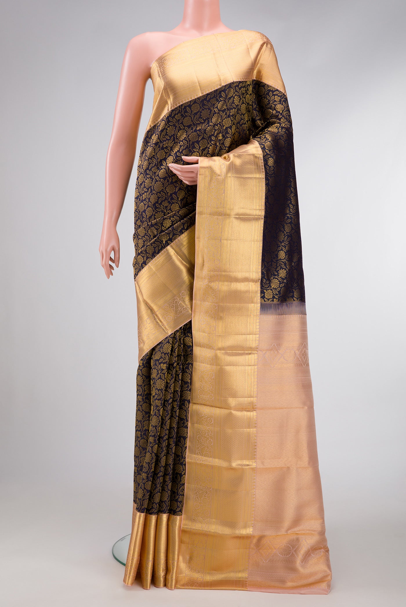 Navy Blue Dual Tone Kanchipuram Silk Saree with Zari Brocade on the body and Zari Border.  displayed on a mannequin