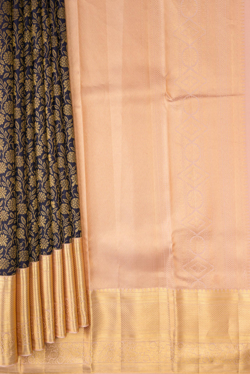 Pleats and pallu of Navy Blue Dual Tone Kanchipuram Silk Saree with Zari Brocade on the body and Zari Border. 