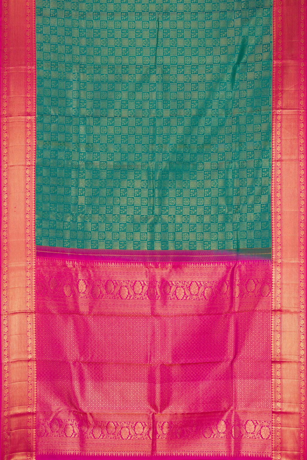 Flat view of Green Kanchipuram Silk Saree with Zari Brocade on the body and Zari Border. 