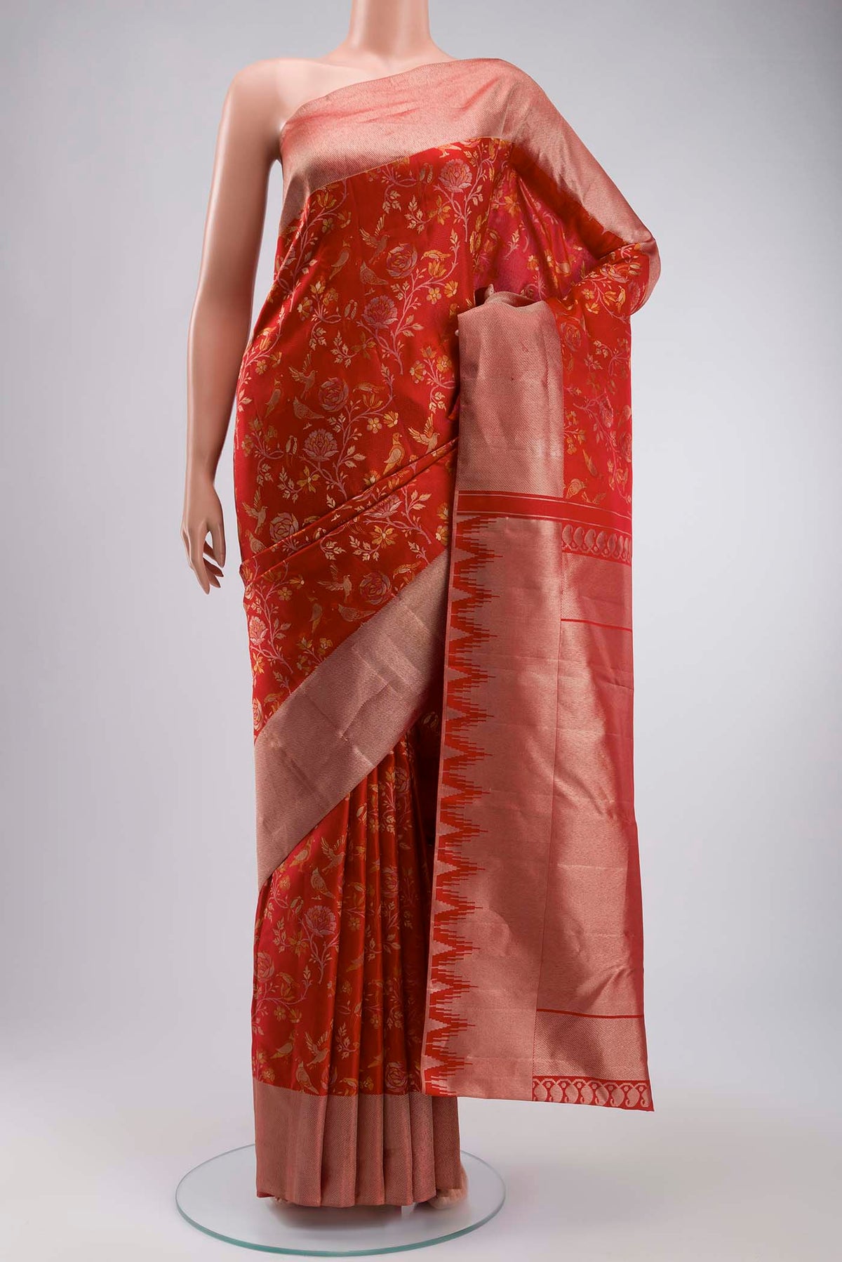Red Kanchipuram Silk Saree with Zari Butta on the body and Zari Border displayed on a mannequin