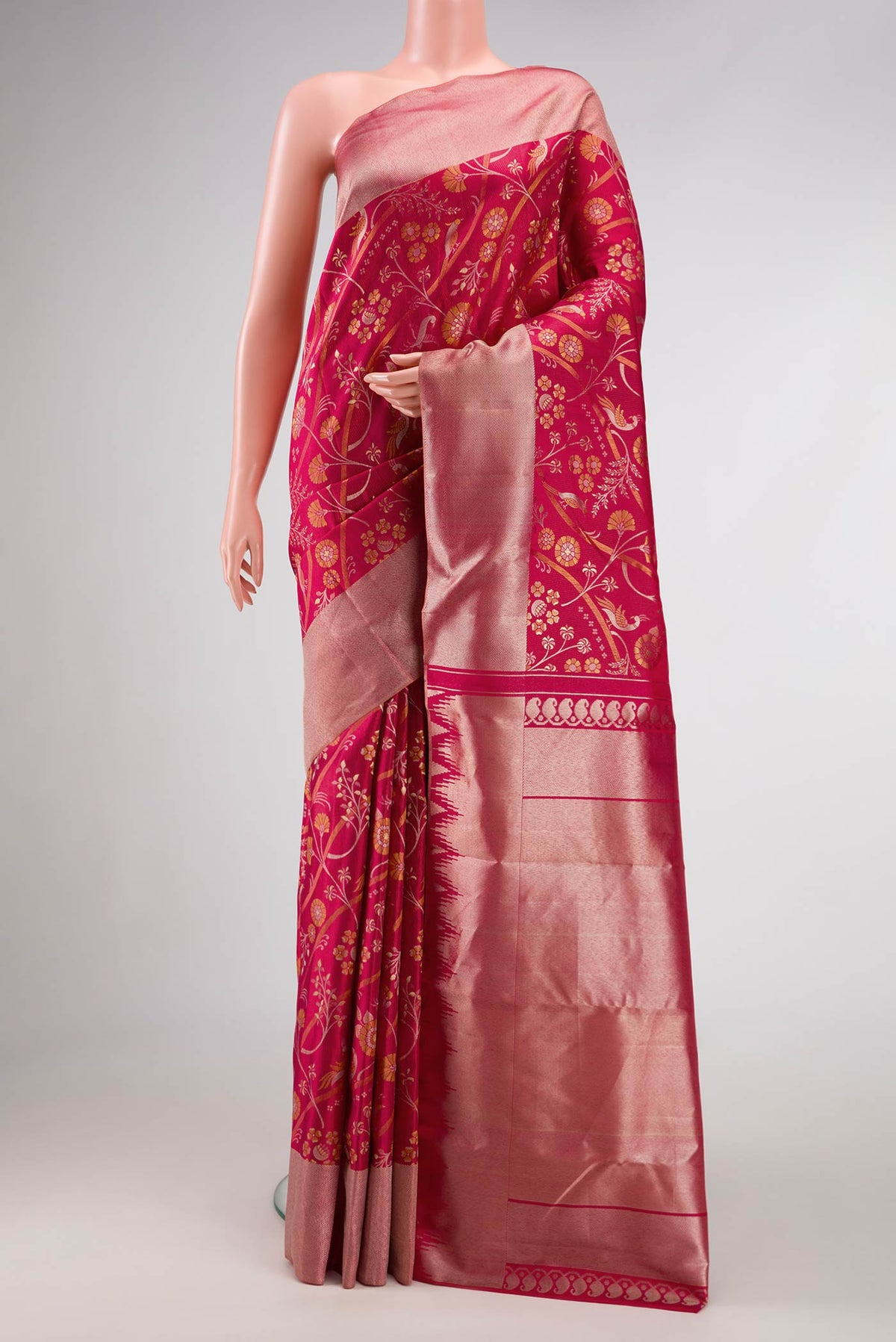 Red Dual Tone Kanjivaram Silk Saree with Zari Brocade on the body and Zari Border.  displayed on a mannequin