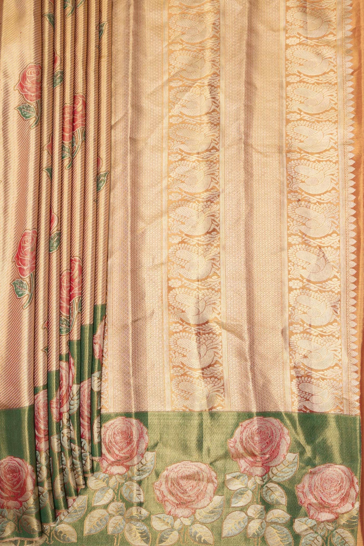 Pleats and pallu of Gold Dual Tone Kanjivaram Tissue Saree with Zari Brocade on the body and Fancy Border. 