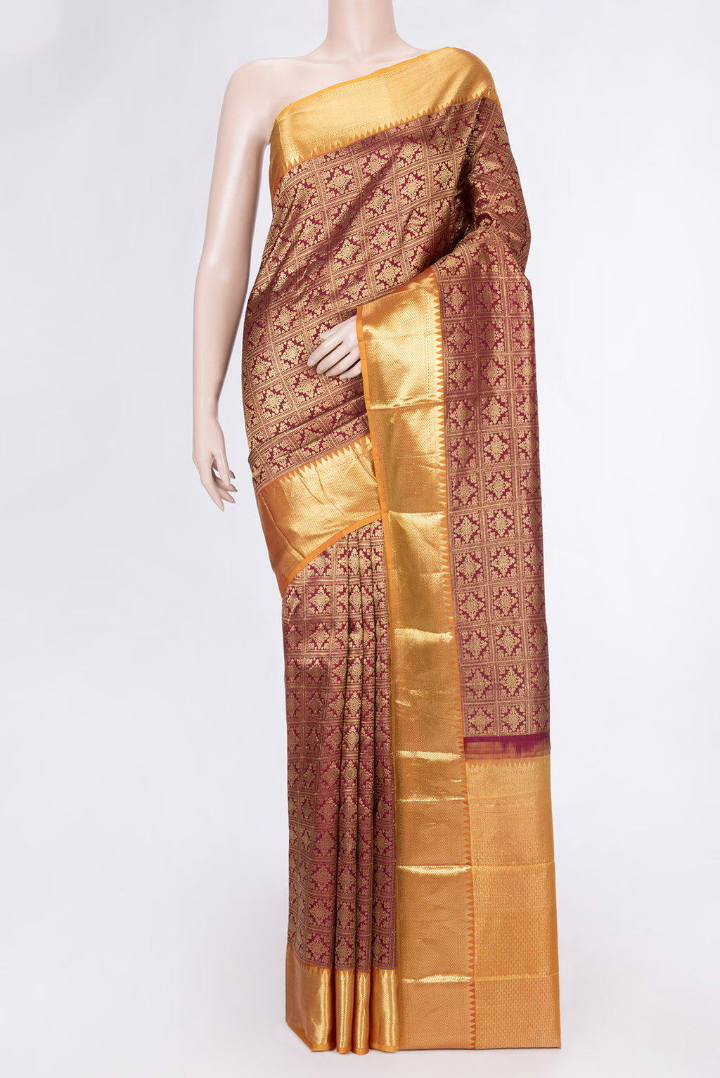 Maroon Dual Tone Kanjivaram Silk Saree with Zari Brocade on the body and Zari Border.  displayed on a mannequin