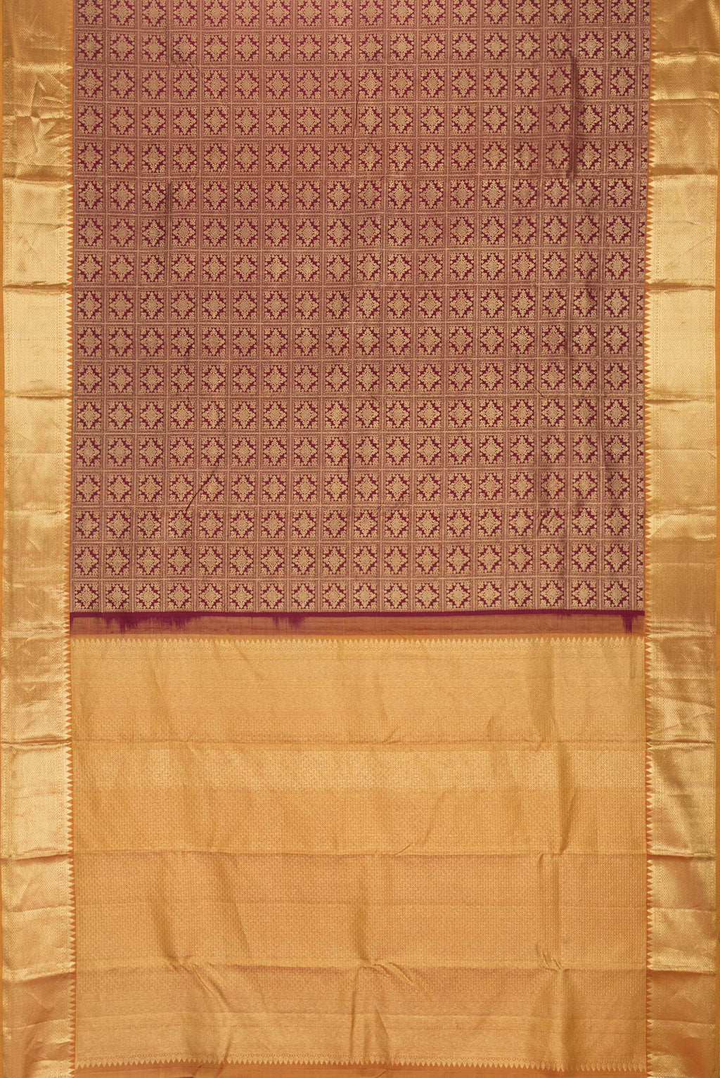 Flat view of Maroon Dual Tone Kanjivaram Silk Saree with Zari Brocade on the body and Zari Border. 
