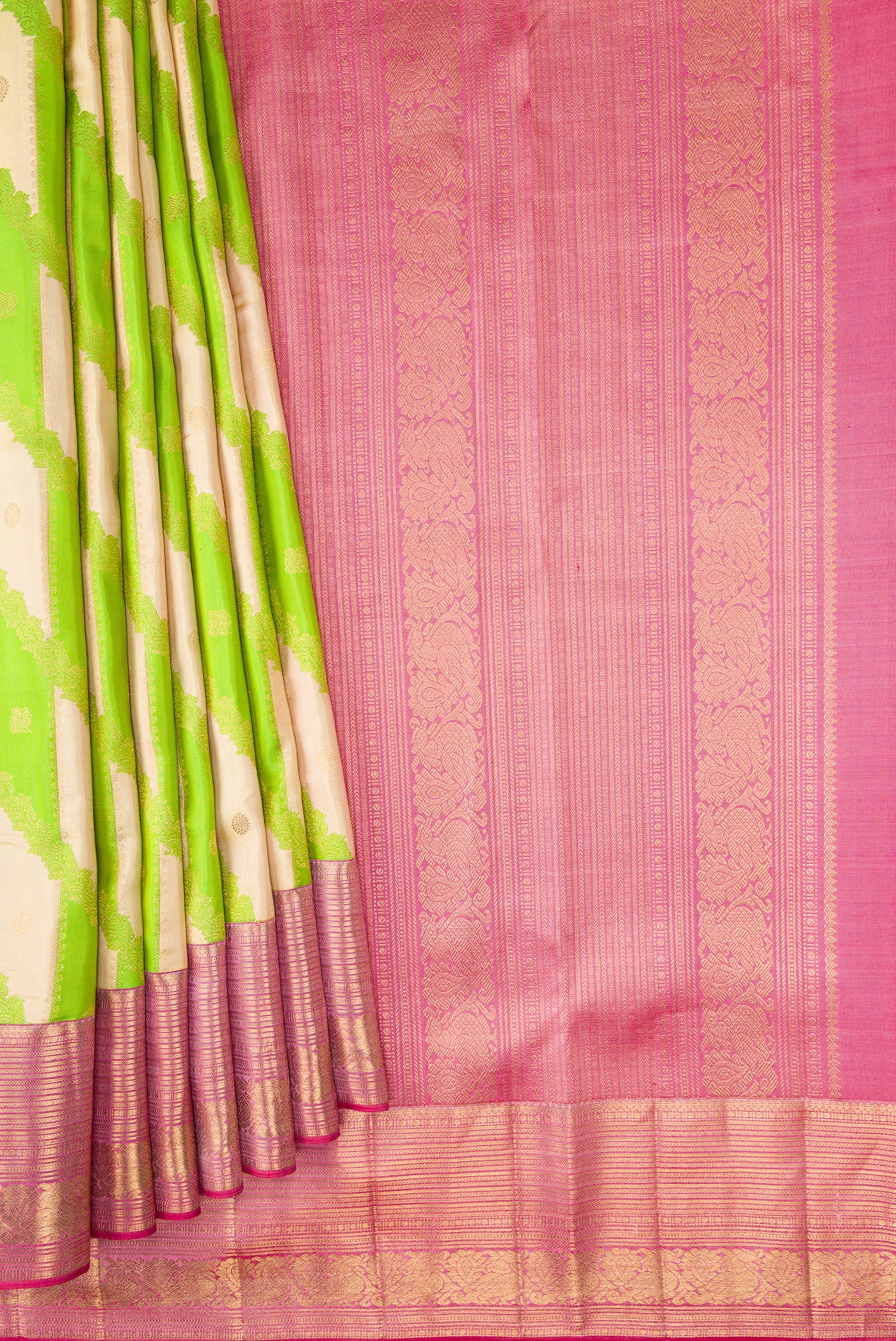 Pleats and pallu of Parrot Green Dual Tone Kanjivaram Silk Saree with Zari Brocade on the body and Zari Border. 