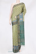 Mehandi Green Dual Tone Tussar Silk Saree with Printed design on the body and Embroidery Border.  displayed on a mannequin
