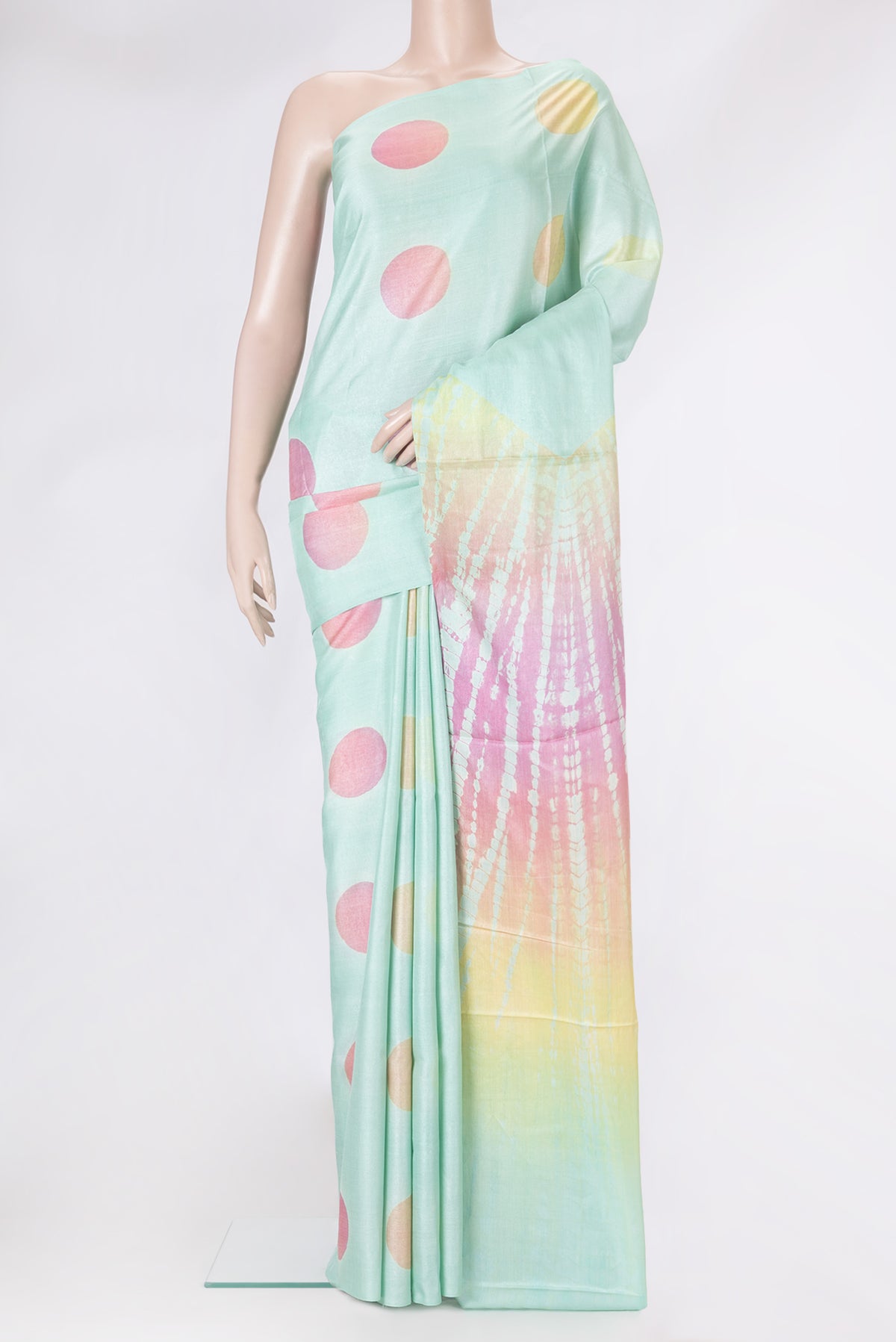 Sea Green Dual Tone Tussar Silk Saree with Printed design on the body and Without Border.  displayed on a mannequin