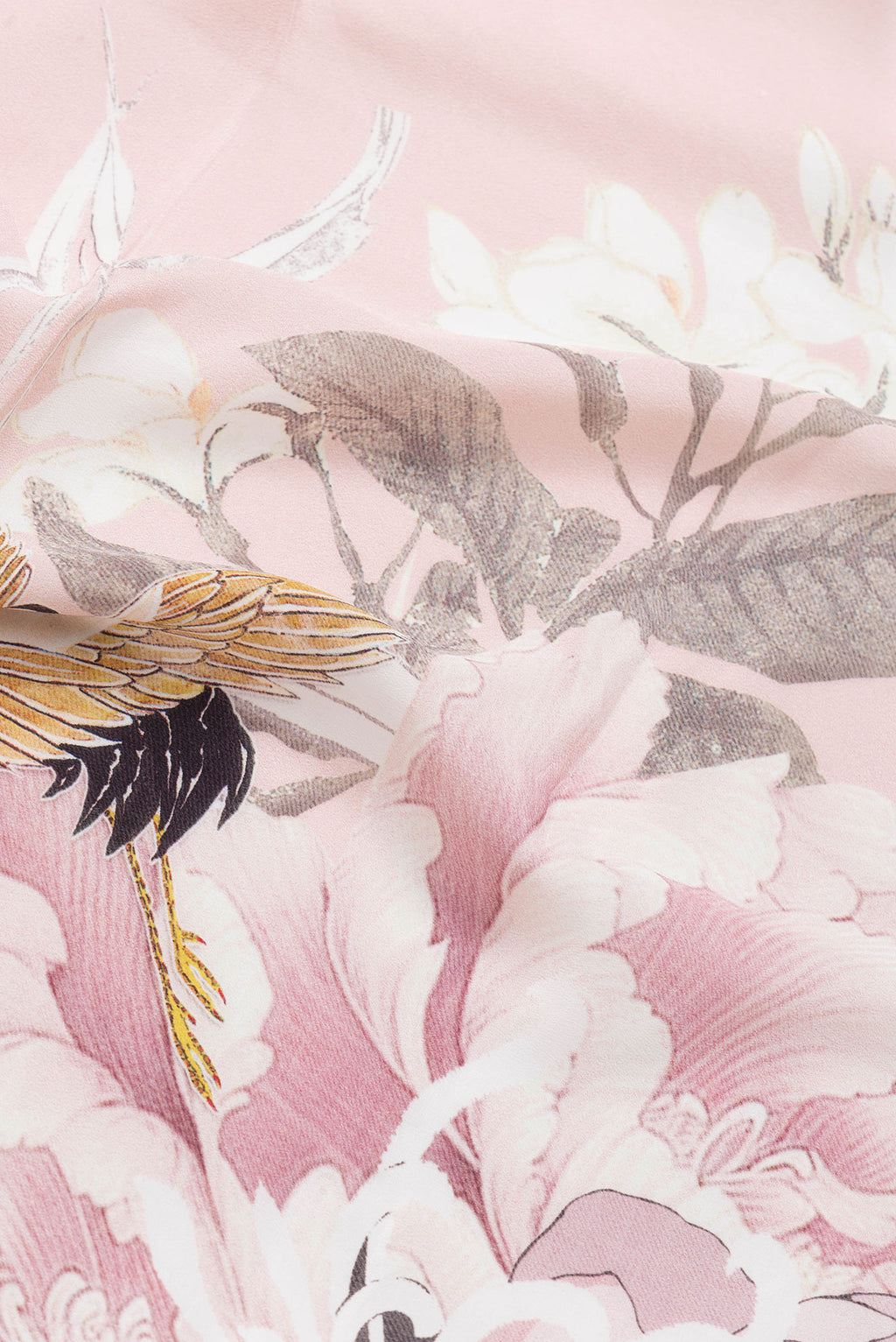 Close up of Rose Gold Dual Tone Mysore Crepe Saree with Printed design on the body and Without Border.  displaying folds