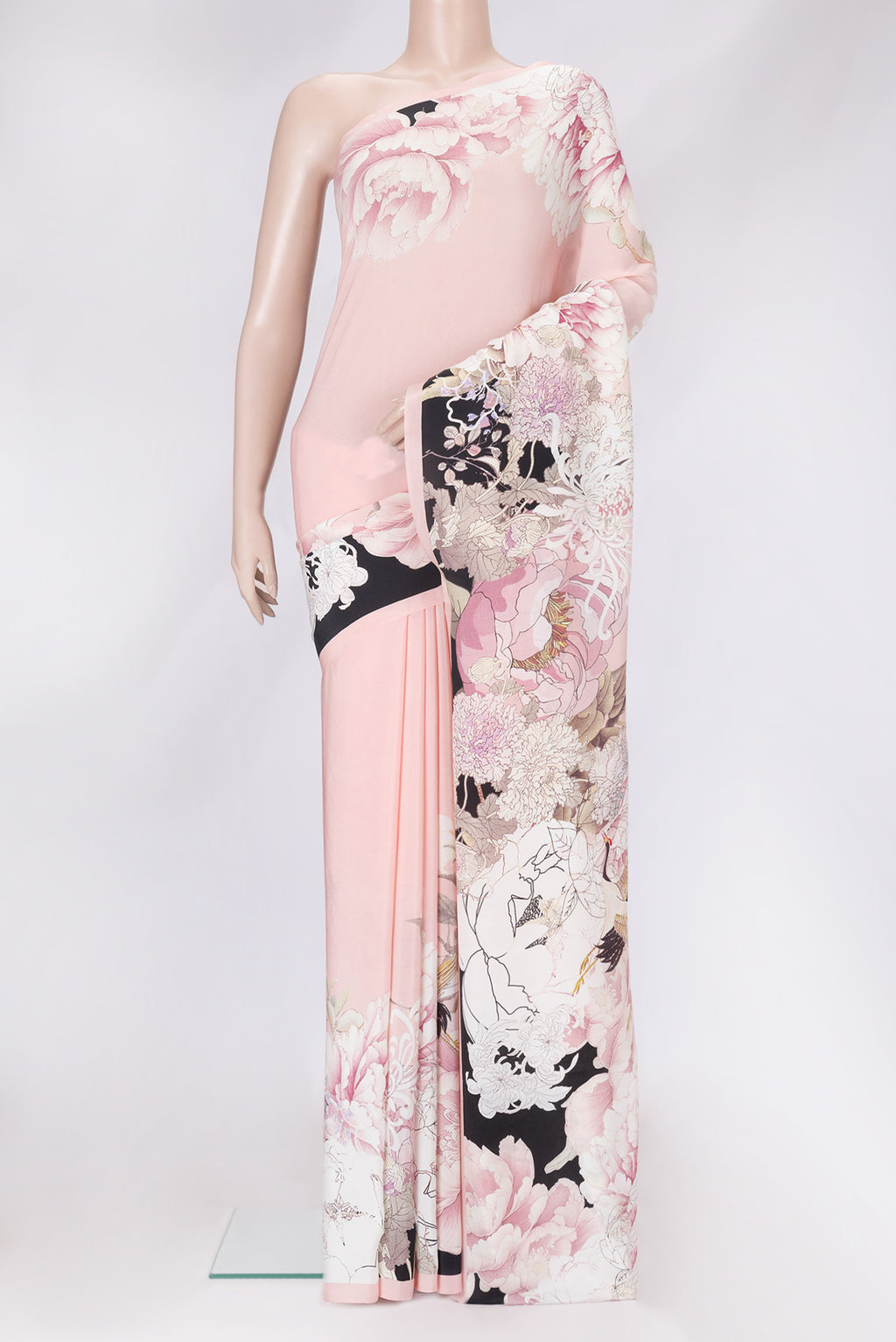 Rose Gold Dual Tone Mysore Crepe Saree with Printed design on the body and Without Border.  displayed on a mannequin