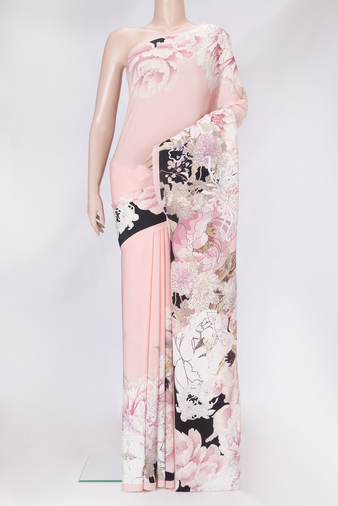 Rose Gold Dual Tone Mysore Crepe Saree with Printed design on the body and Without Border.  displayed on a mannequin