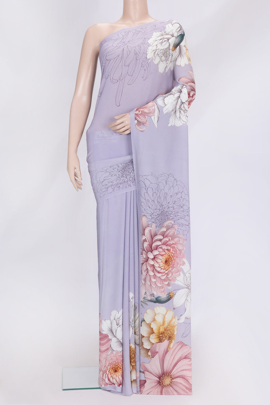 Lavender Dual Tone Crepe Saree with Printed design on the body and Without Border.  displayed on a mannequin