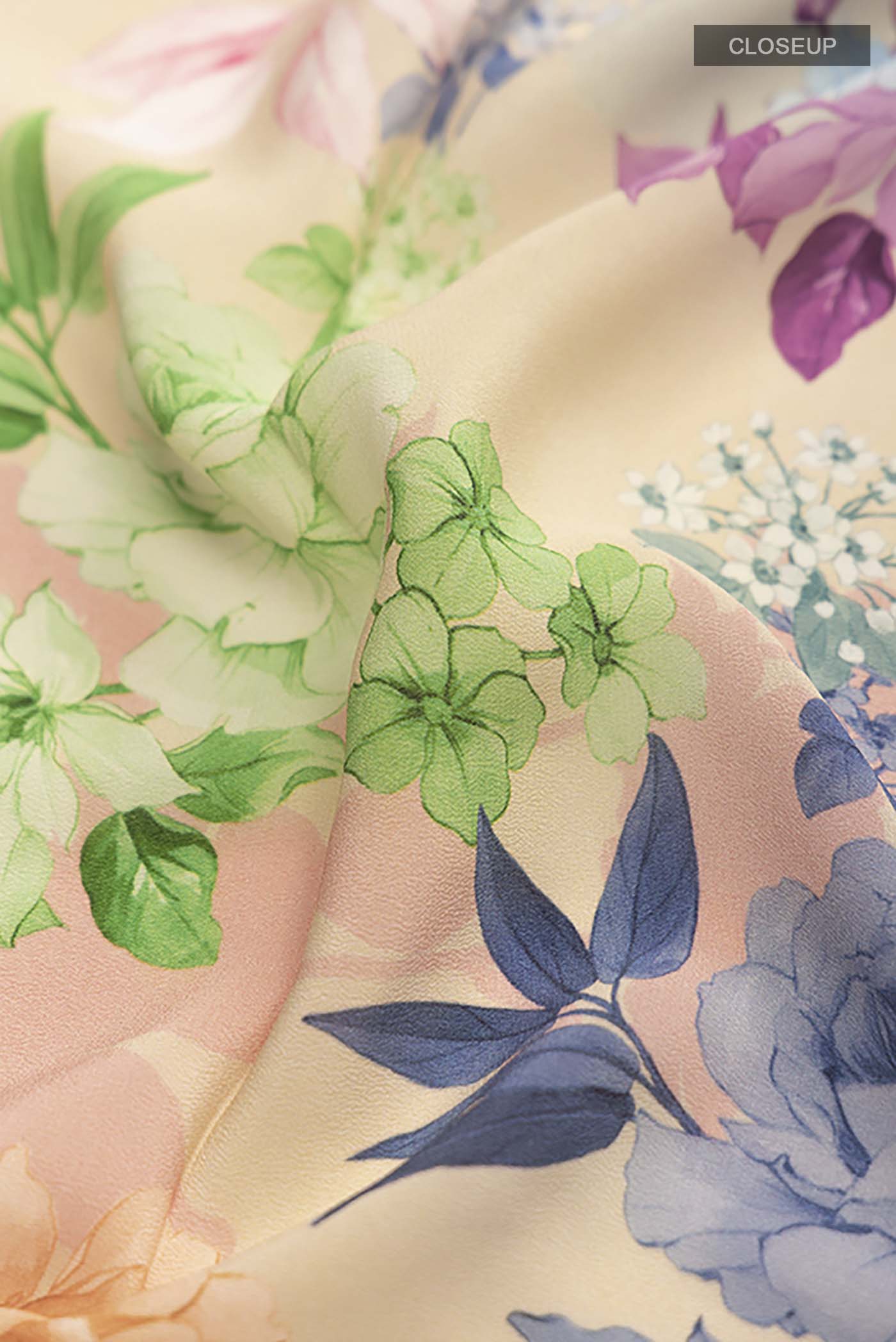 Close up of Beige Mysore Crepe Saree with Printed design on the body and Plain Border displaying folds