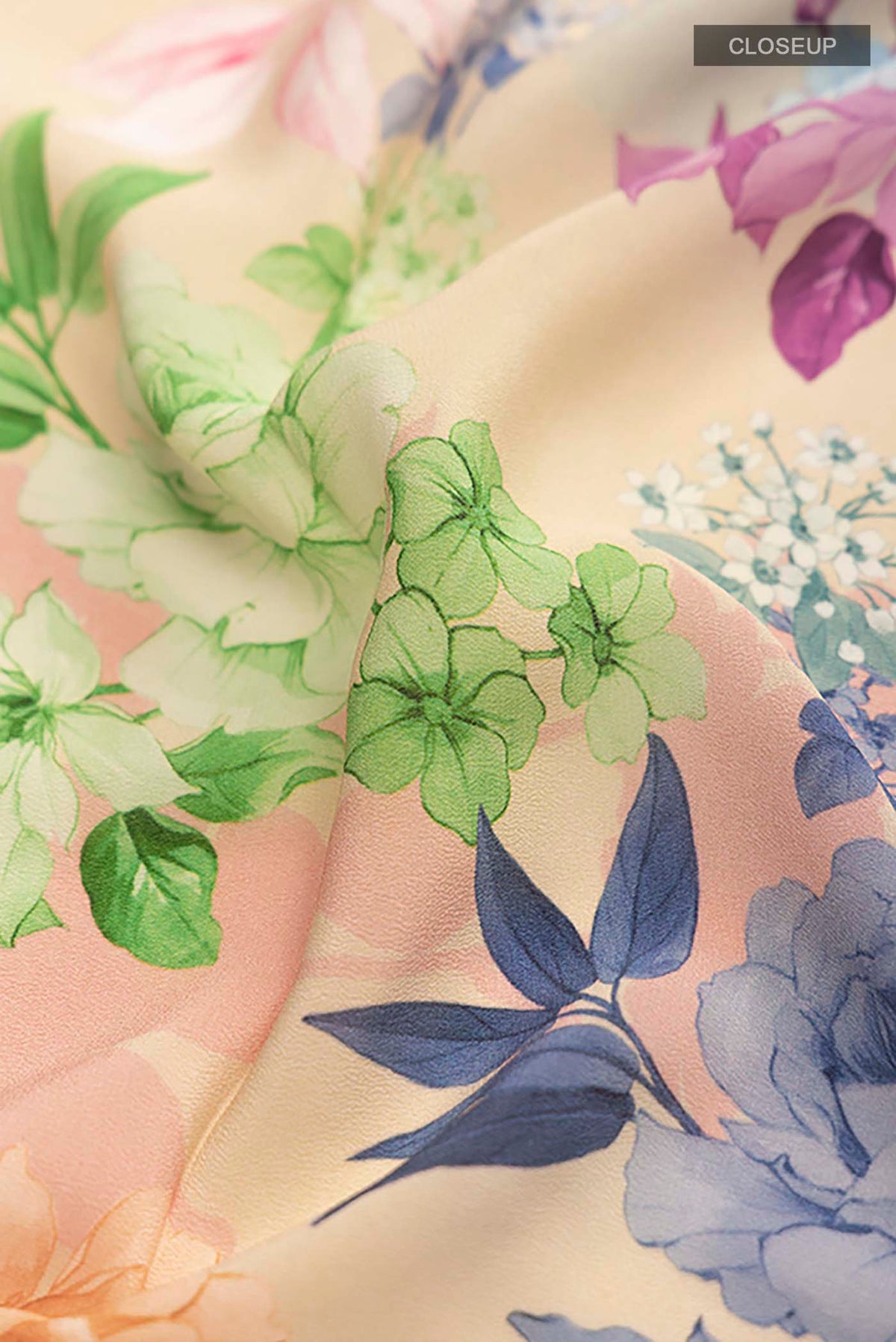 Close up of Beige Mysore Crepe Saree with Printed design on the body and Plain Border displaying folds