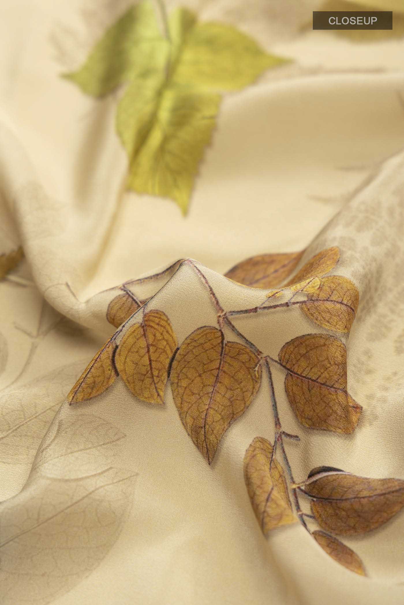 Close up of Beige Mysore Crepe Saree with Printed design on the body and Plain Border displaying folds