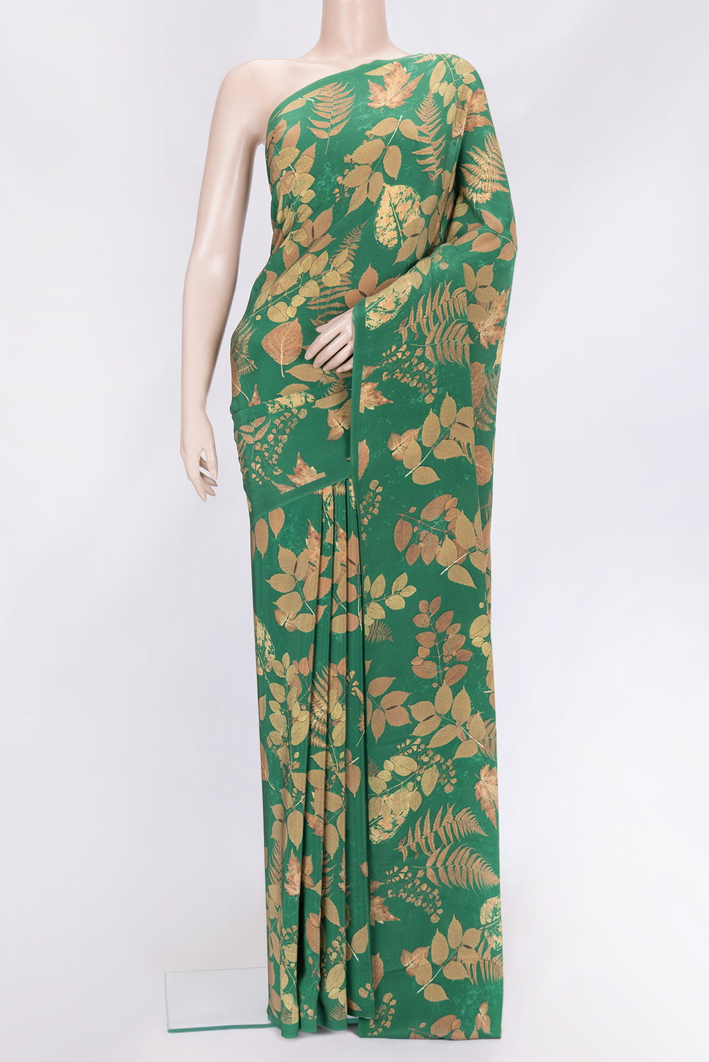 Green Dual Tone Crepe Saree with Printed design on the body and Without Border.  displayed on a mannequin