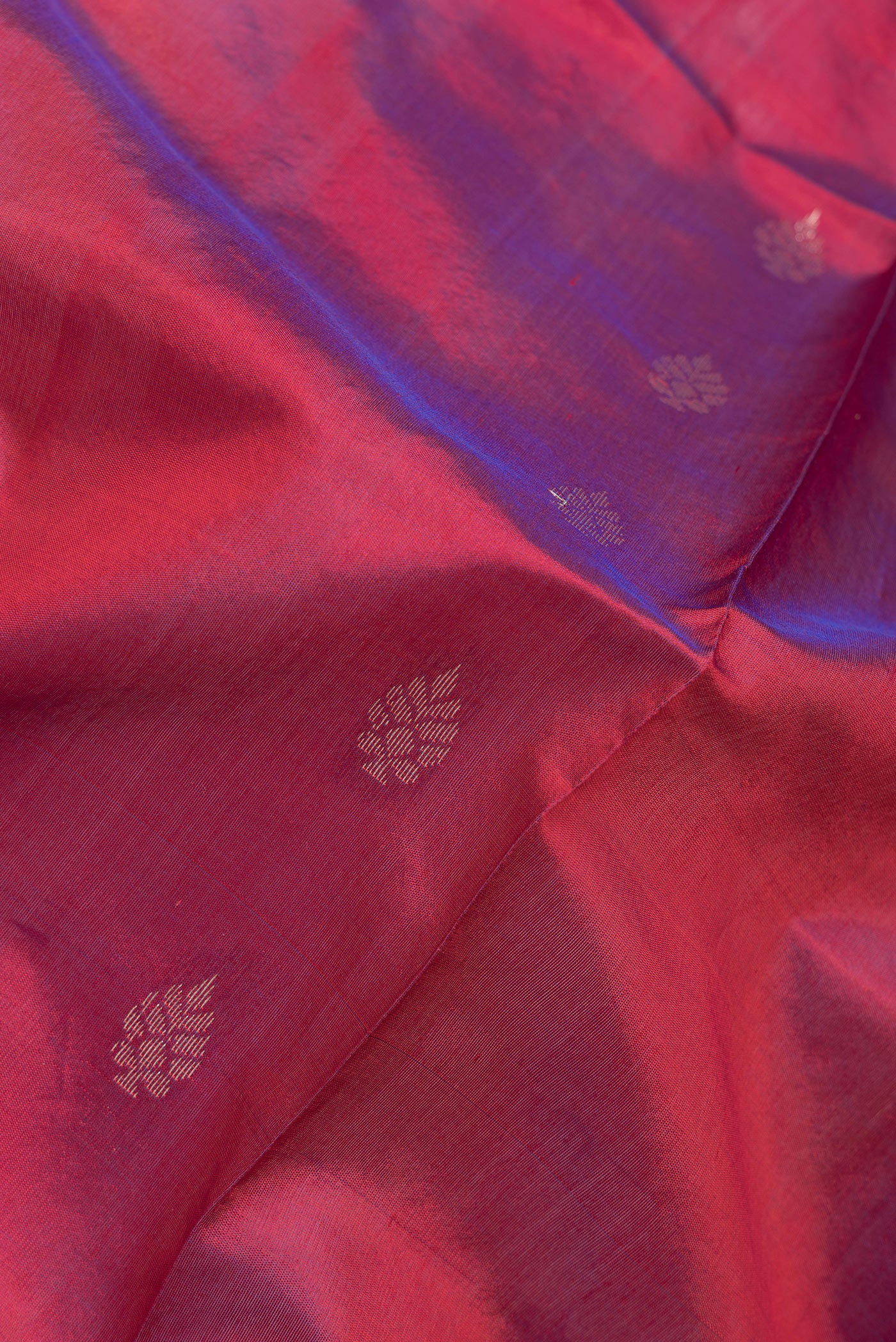 Close up of Pink Dual Tone Banarasi Silk Saree with Zari Butta on the body and Zari Border.  displaying folds