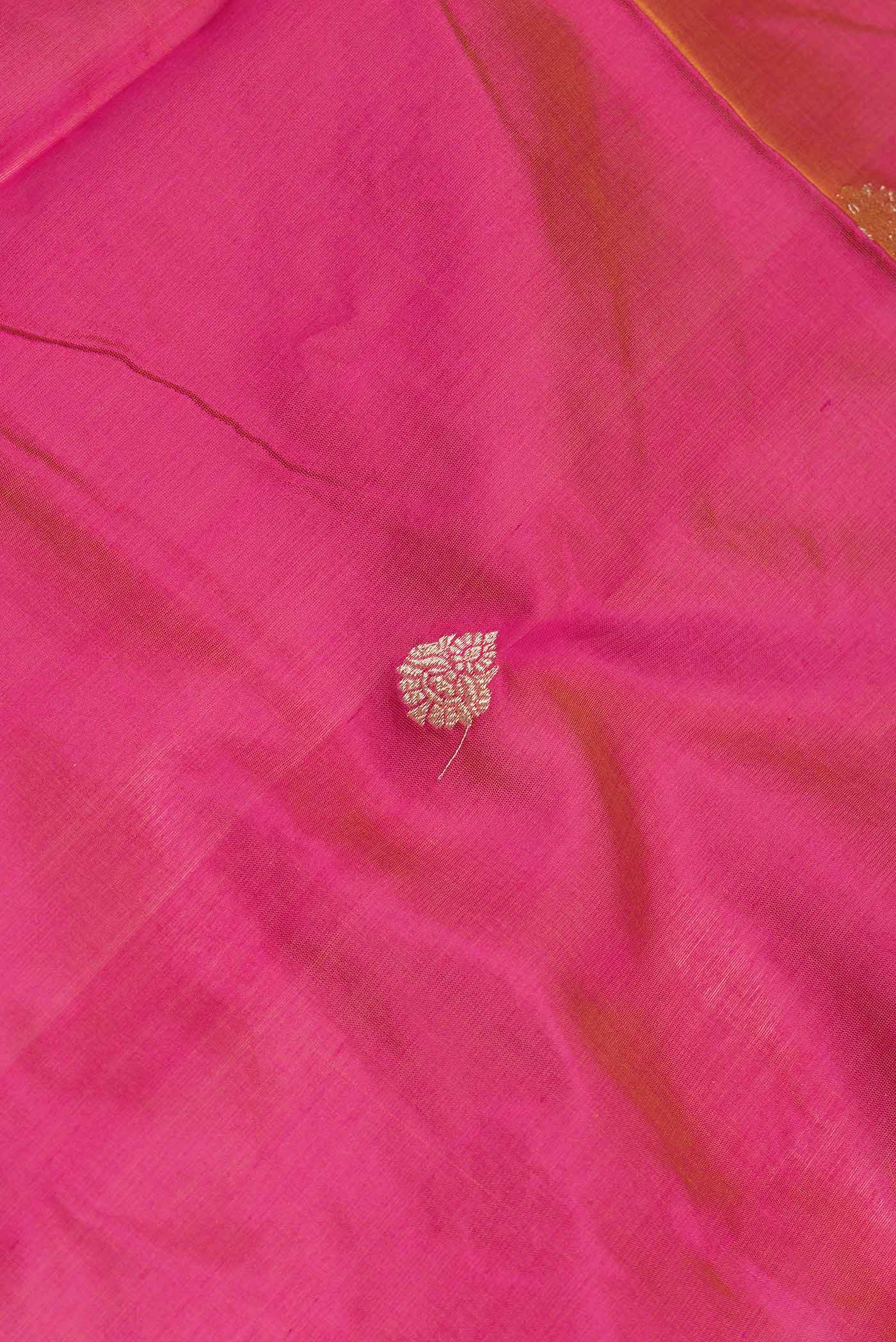 Close up of Pink Dual Tone Banarasi Silk Saree with Zari Butta on the body and Zari Border.  displaying folds
