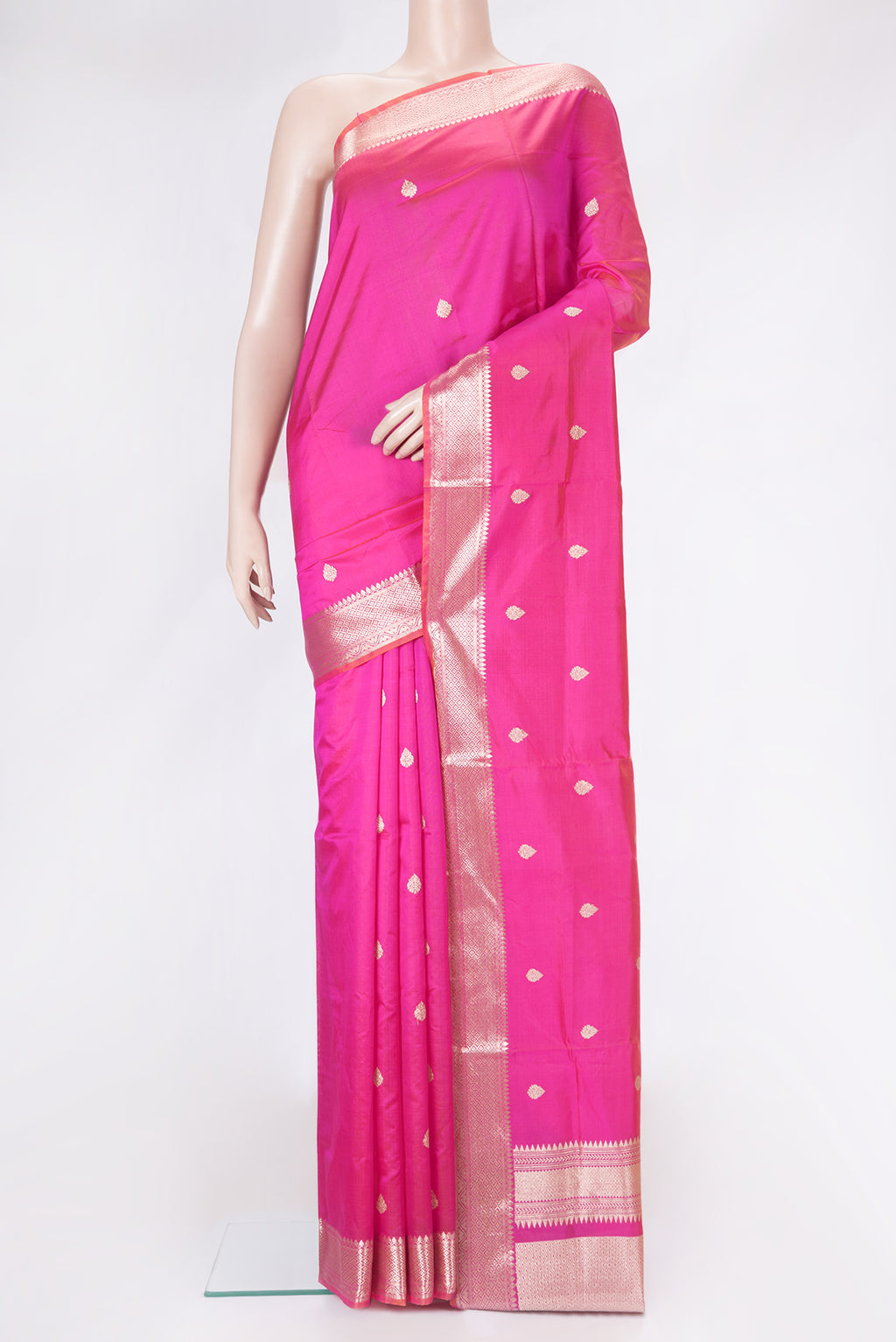 Pink Dual Tone Banarasi Silk Saree with Zari Butta on the body and Zari Border.  displayed on a mannequin