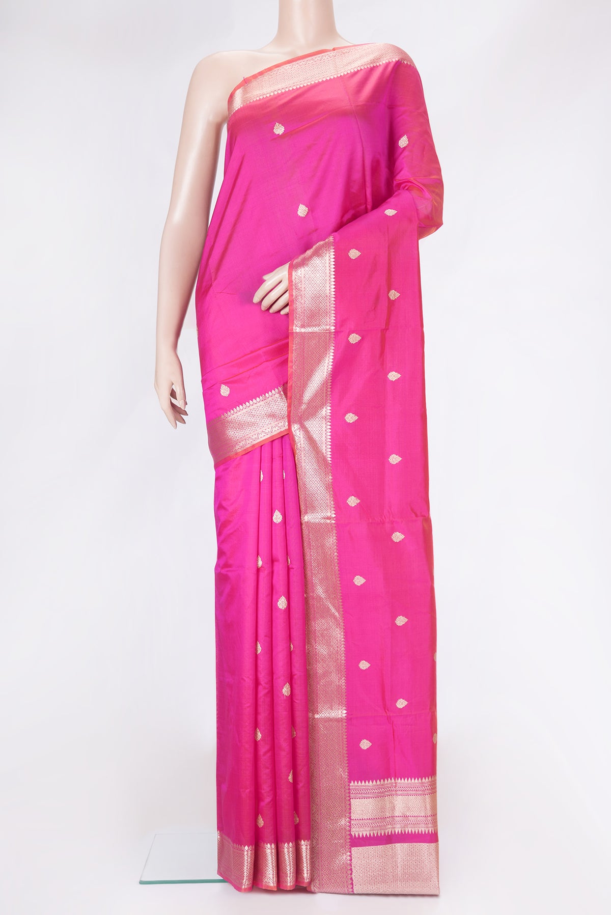 Pink Dual Tone Banarasi Silk Saree with Zari Butta on the body and Zari Border.  displayed on a mannequin
