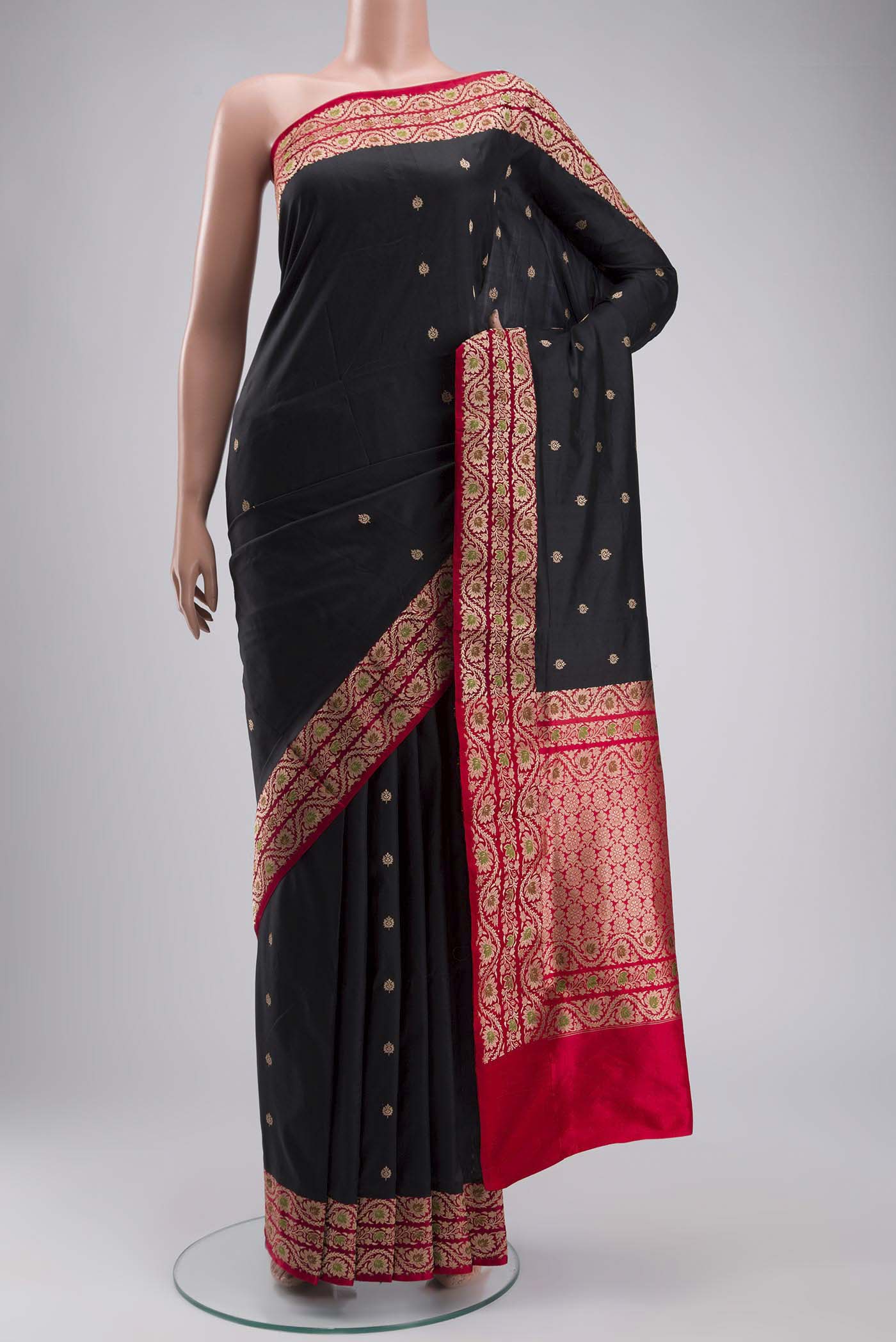 Black Banarasi Katan Silk Saree with Zari Butta on the body and Zari Border displayed on a mannequin