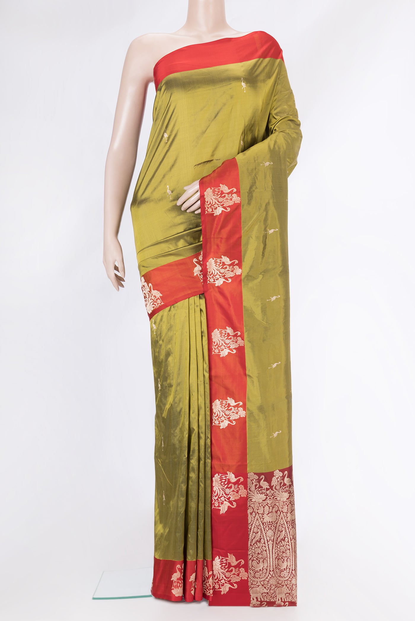 Mehandi Green Dual Tone Banarasi Silk Saree with Zari Butta on the body and Fancy Border.  displayed on a mannequin
