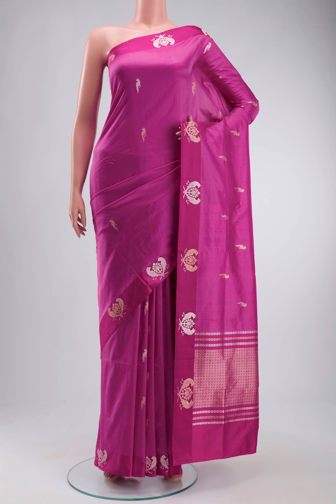 Light Magenta Banarasi Katan Silk Saree with Zari Butta on the body and Satin Border displayed on a mannequin