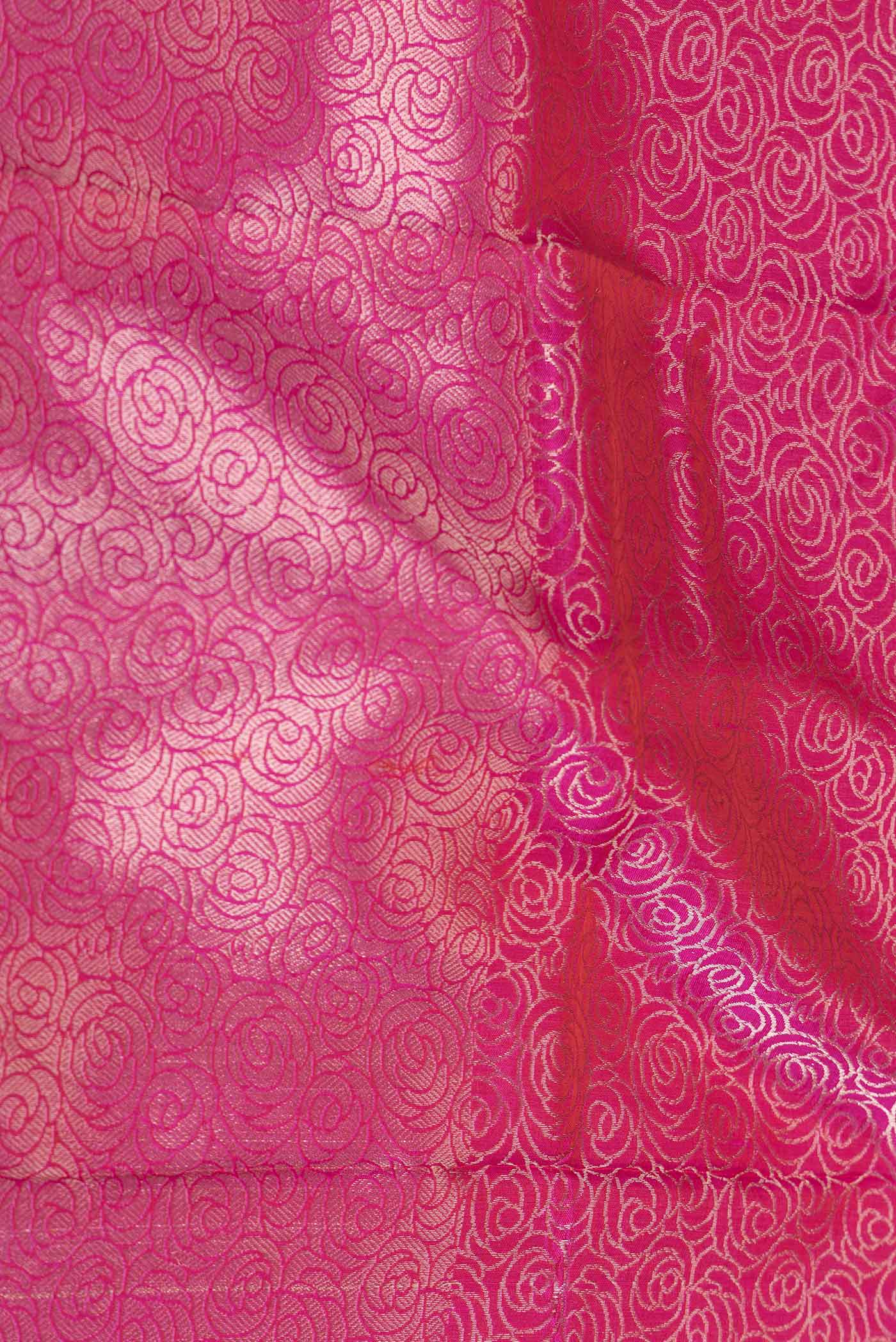 Close up of Pink Dual Tone Banarasi Silk Saree with Zari Brocade on the body and Zari Border displaying folds